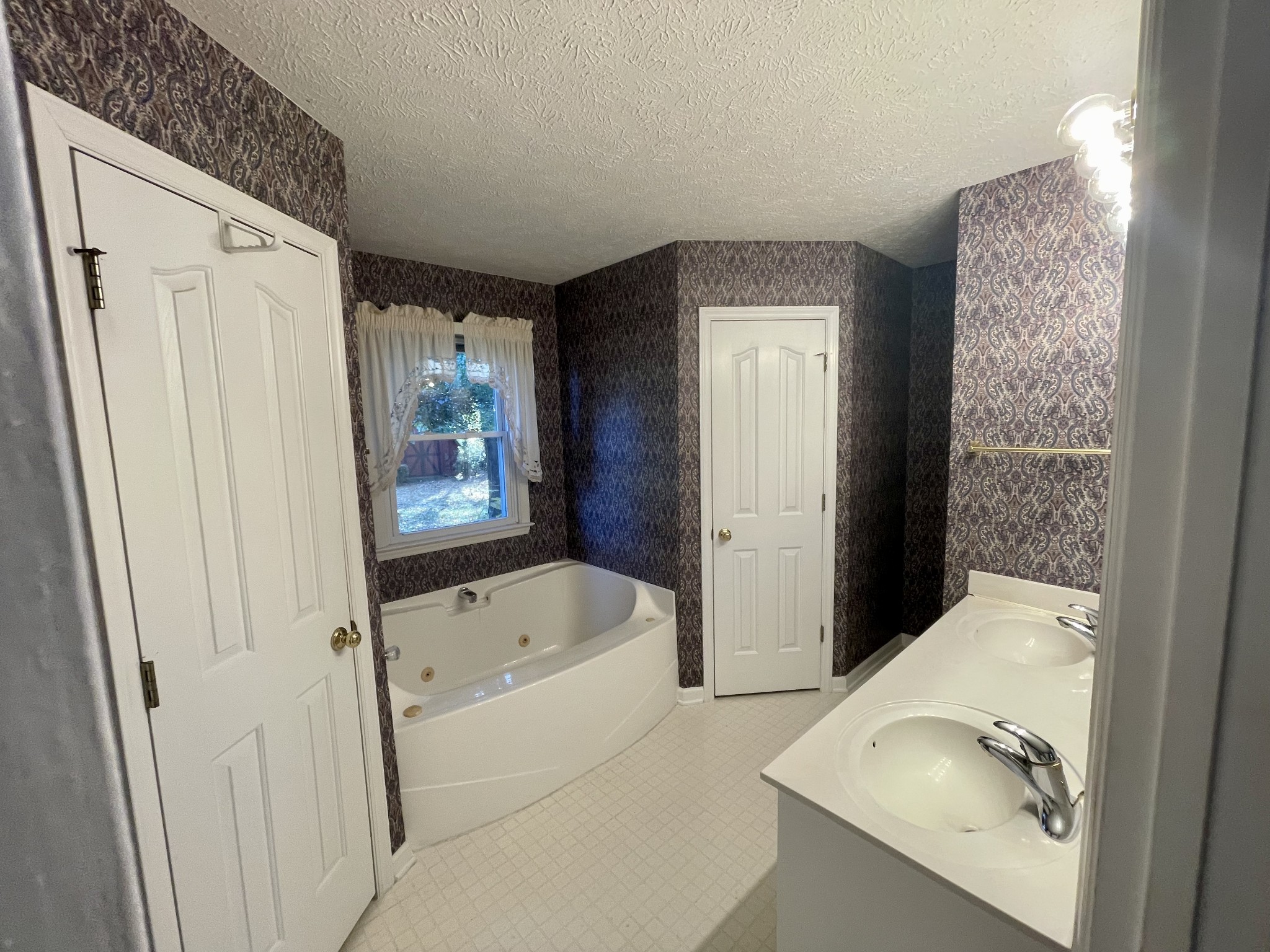 3114 Chanda Lane Murfreesboro, TN 37129 - Photo 11 of 12 a bathroom with a tub sink and mirror