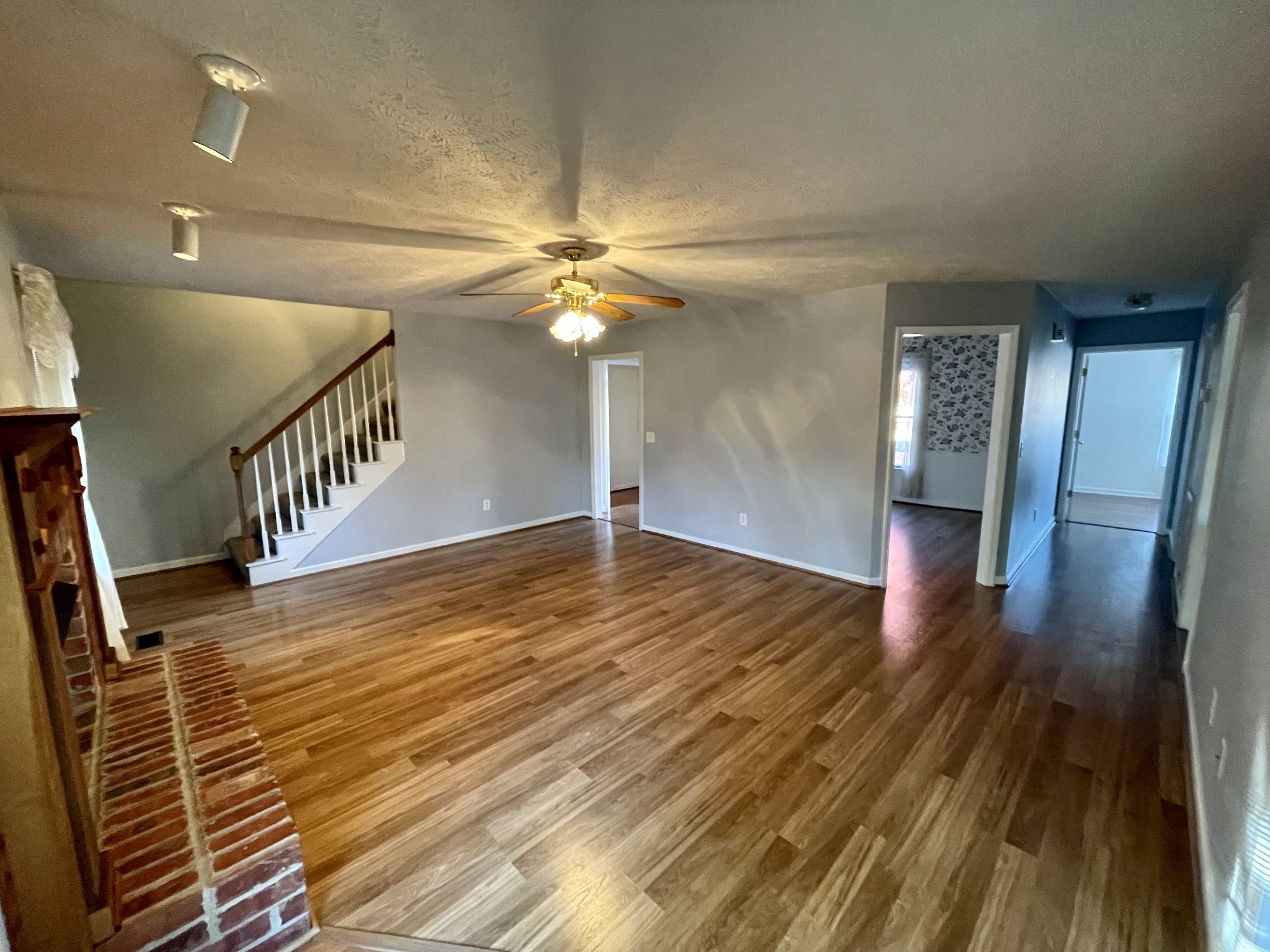 3114 Chanda Lane Murfreesboro, TN 37129 - Photo 5 of 12 a view of an empty room with wooden floor