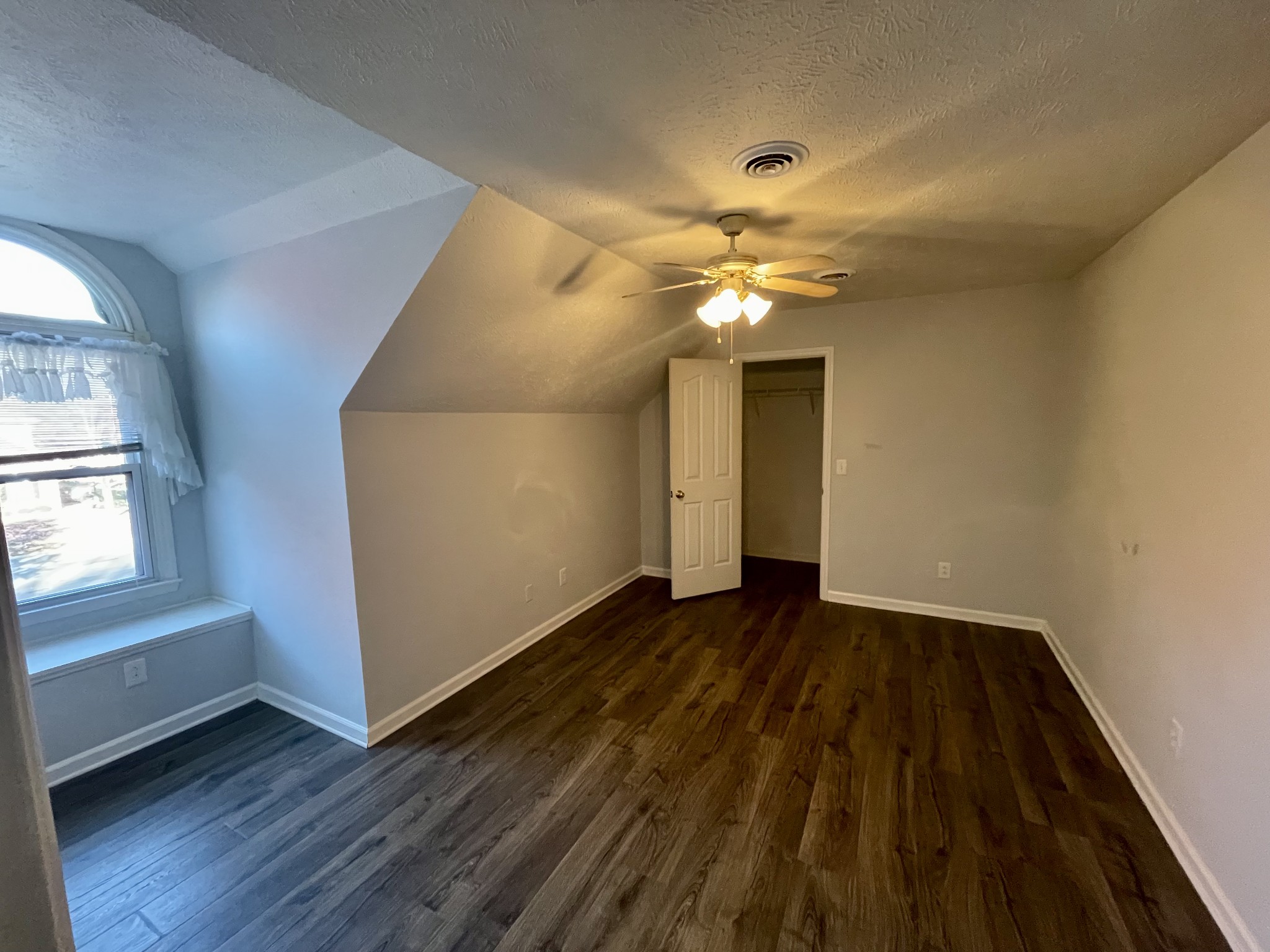 3114 Chanda Lane Murfreesboro, TN 37129 - Photo 8 of 12 wooden floor in an empty room with a window