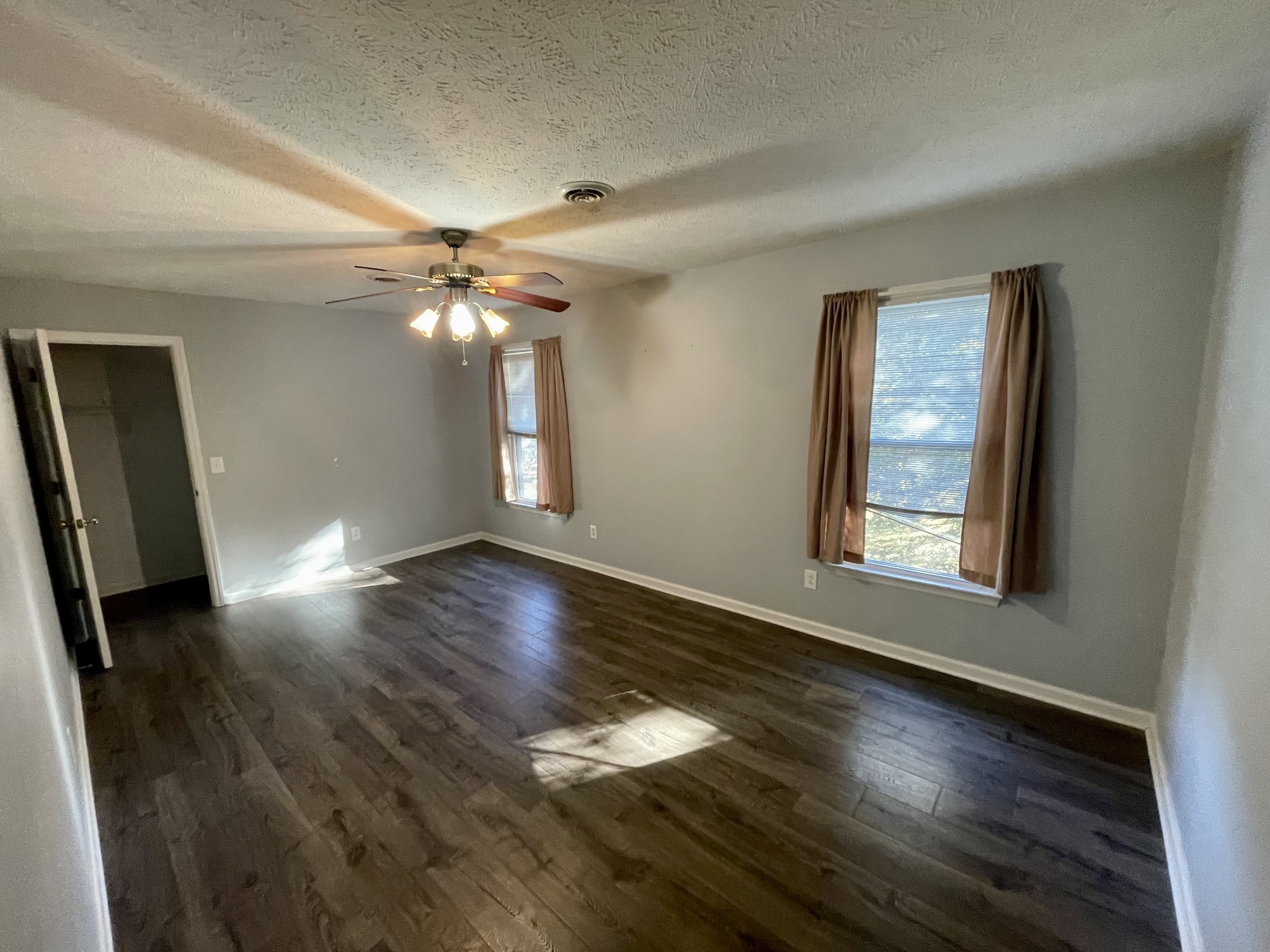 3114 Chanda Lane Murfreesboro, TN 37129 - Photo 9 of 12 wooden floor in an empty room with a window