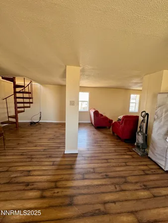 a living room with couch and a table