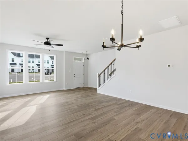 a view of a kitchen with a sink and cabinets