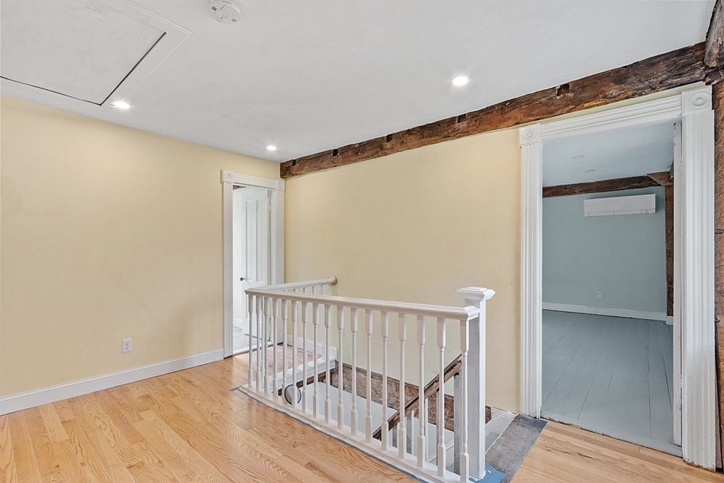 230 7 Bridge Road Lancaster, MA 01523 - Photo 23 of 33 a view of hallway with wooden floor