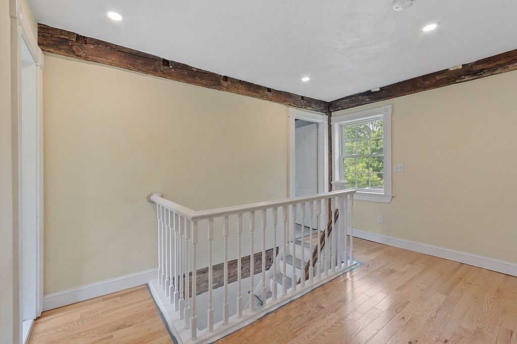 230 7 Bridge Road Lancaster, MA 01523 - Photo 24 of 33 a view of entryway with stairs and wooden floor