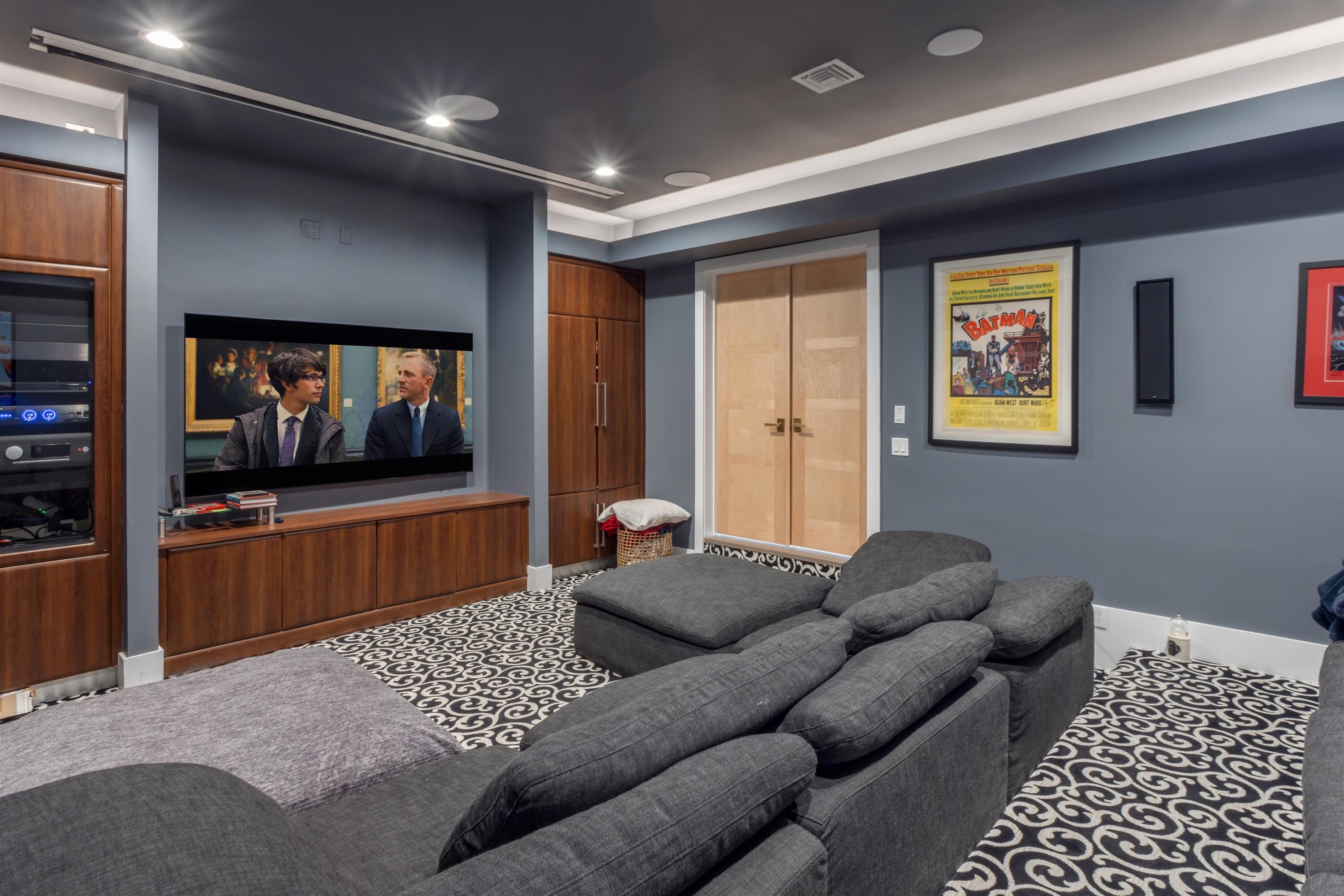 4698 Sanctuary Lane Boca Raton, FL 33431 - Photo 11 of 43 a living room with furniture and a flat screen tv
