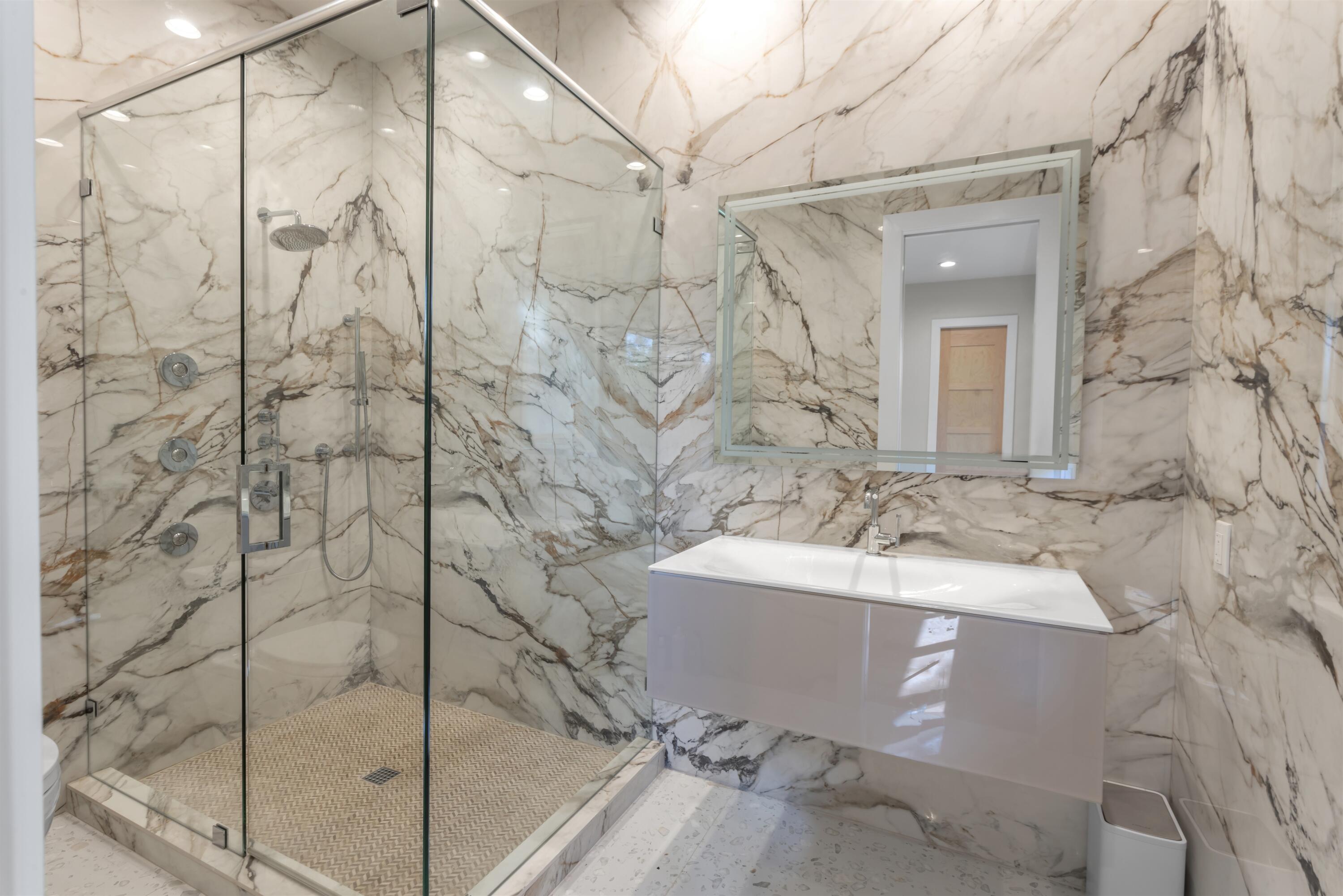 4698 Sanctuary Lane Boca Raton, FL 33431 - Photo 35 of 43 a bathroom with a sink and a bathtub