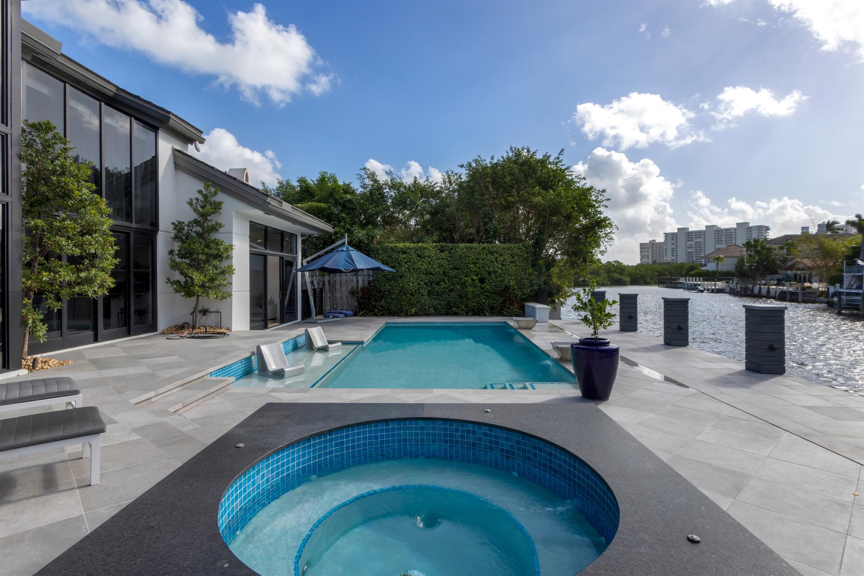4698 Sanctuary Lane Boca Raton, FL 33431 - Photo 38 of 43 a view of a house with backyard and sitting area
