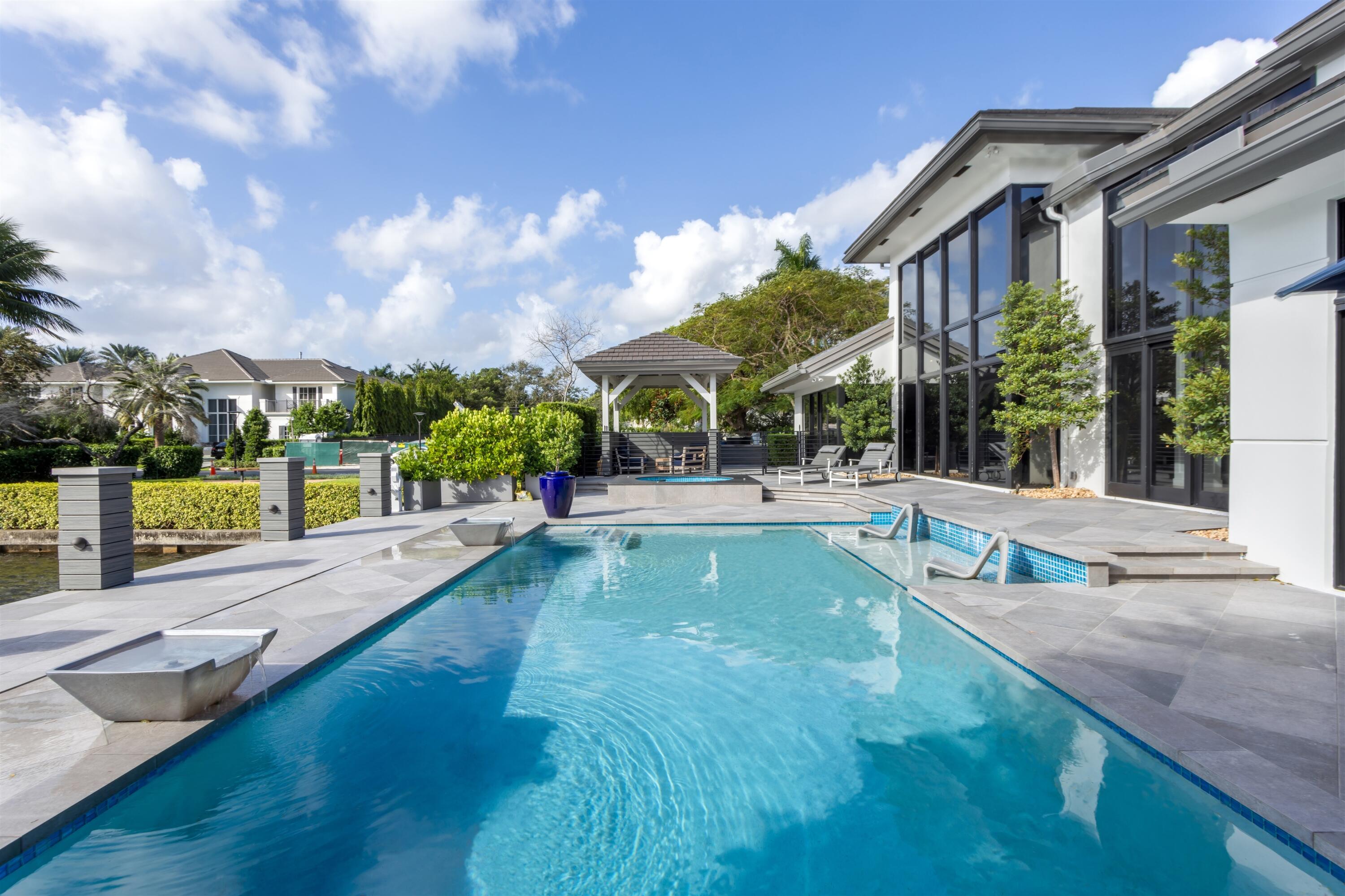 4698 Sanctuary Lane Boca Raton, FL 33431 - Photo 42 of 43 a view of a house with a yard