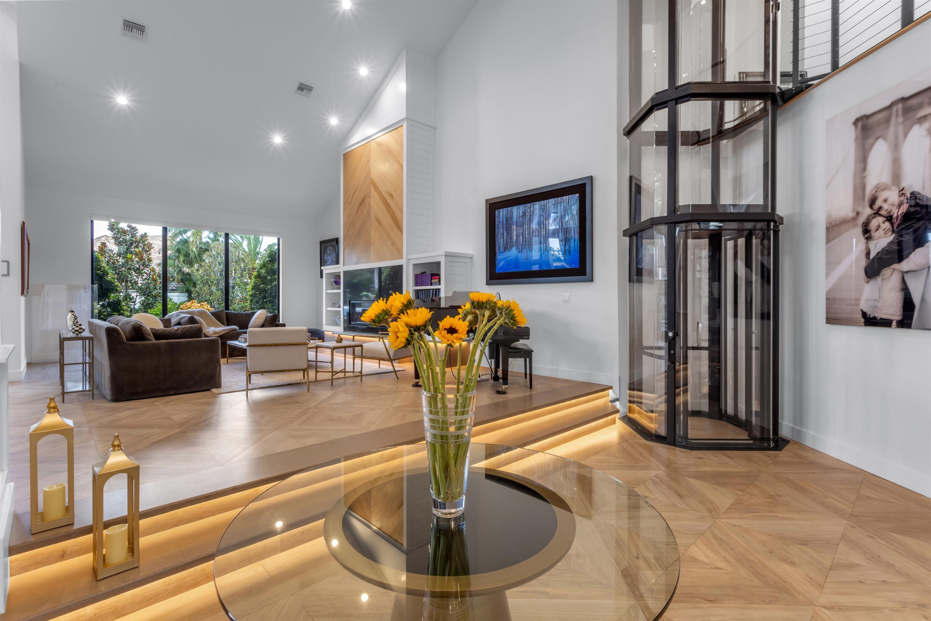 4698 Sanctuary Lane Boca Raton, FL 33431 - Photo 5 of 43 a lobby with furniture and floor to ceiling window