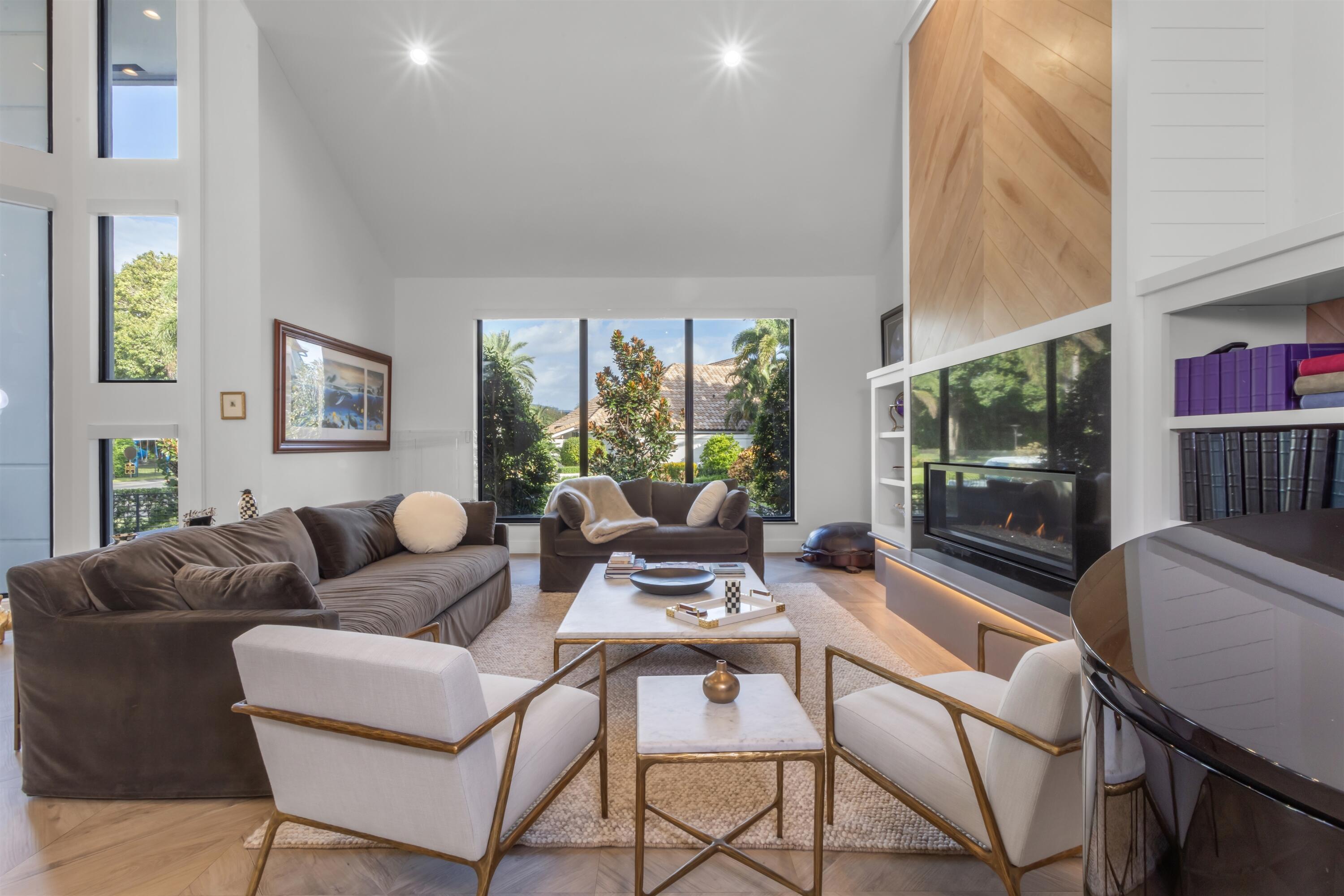 4698 Sanctuary Lane Boca Raton, FL 33431 - Photo 7 of 43 a living room with furniture and a flat screen tv