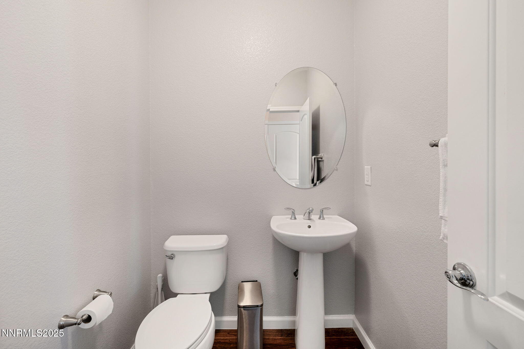 1876 Braemore Drive Reno, NV 89521 - Photo 11 of 34 a bathroom with a toilet sink and mirror