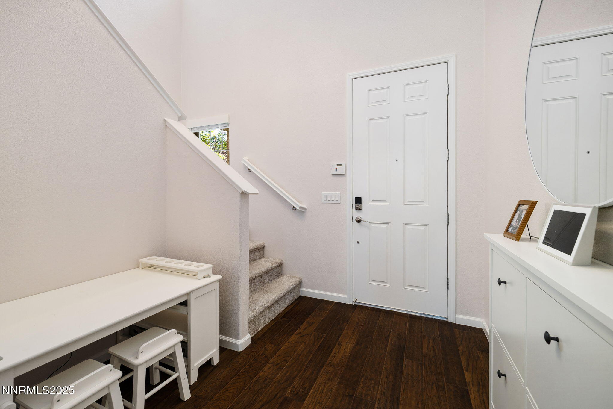 1876 Braemore Drive Reno, NV 89521 - Photo 12 of 34 a view of a room with wooden floor and staircase