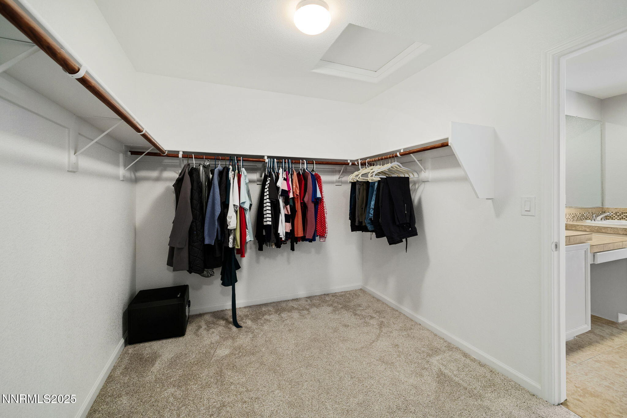 1876 Braemore Drive Reno, NV 89521 - Photo 22 of 34 a view of walk in closet with clothes