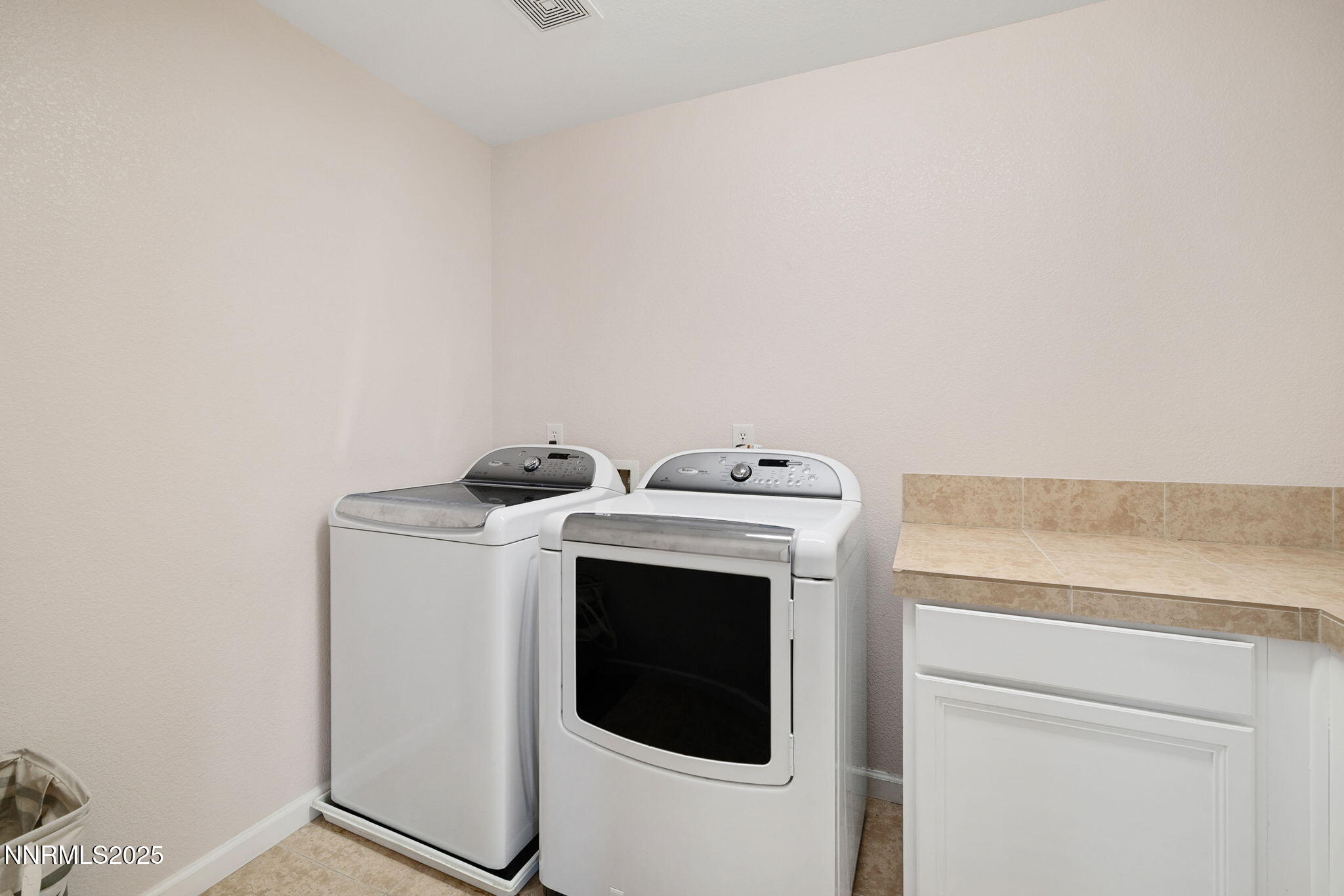 1876 Braemore Drive Reno, NV 89521 - Photo 25 of 34 a utility room with dryer and washer