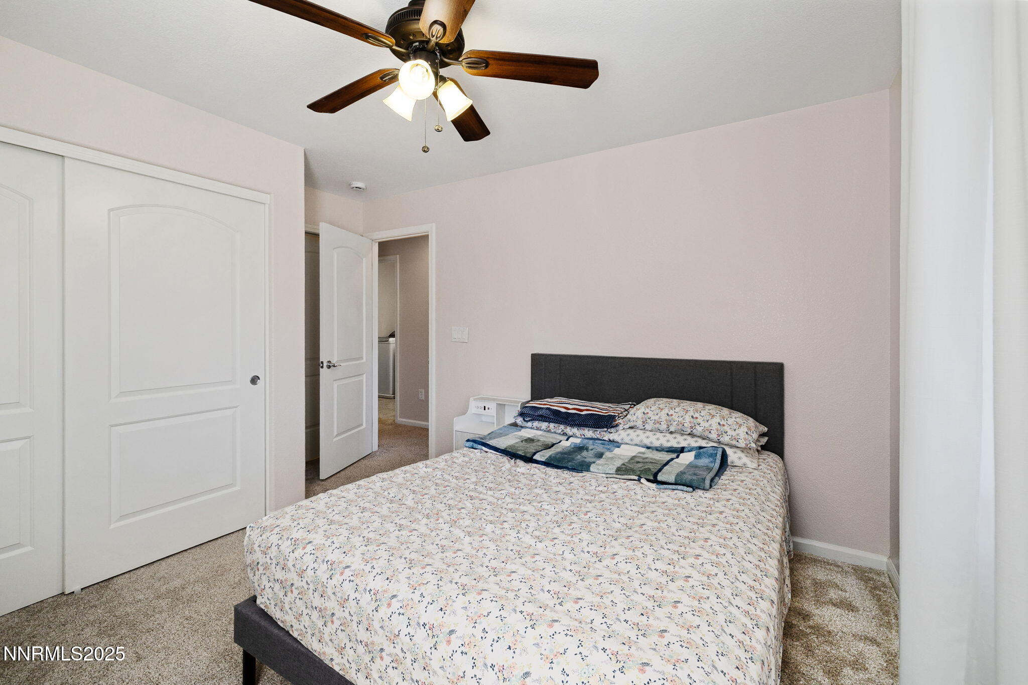 1876 Braemore Drive Reno, NV 89521 - Photo 28 of 34 a bedroom with a bed and a dresser