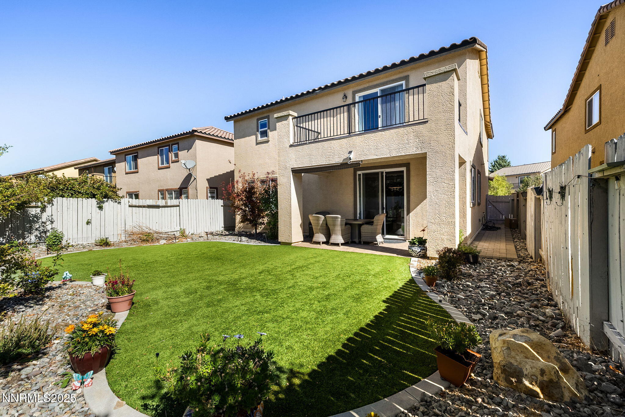 1876 Braemore Drive Reno, NV 89521 - Photo 31 of 34 a front view of a house with garden