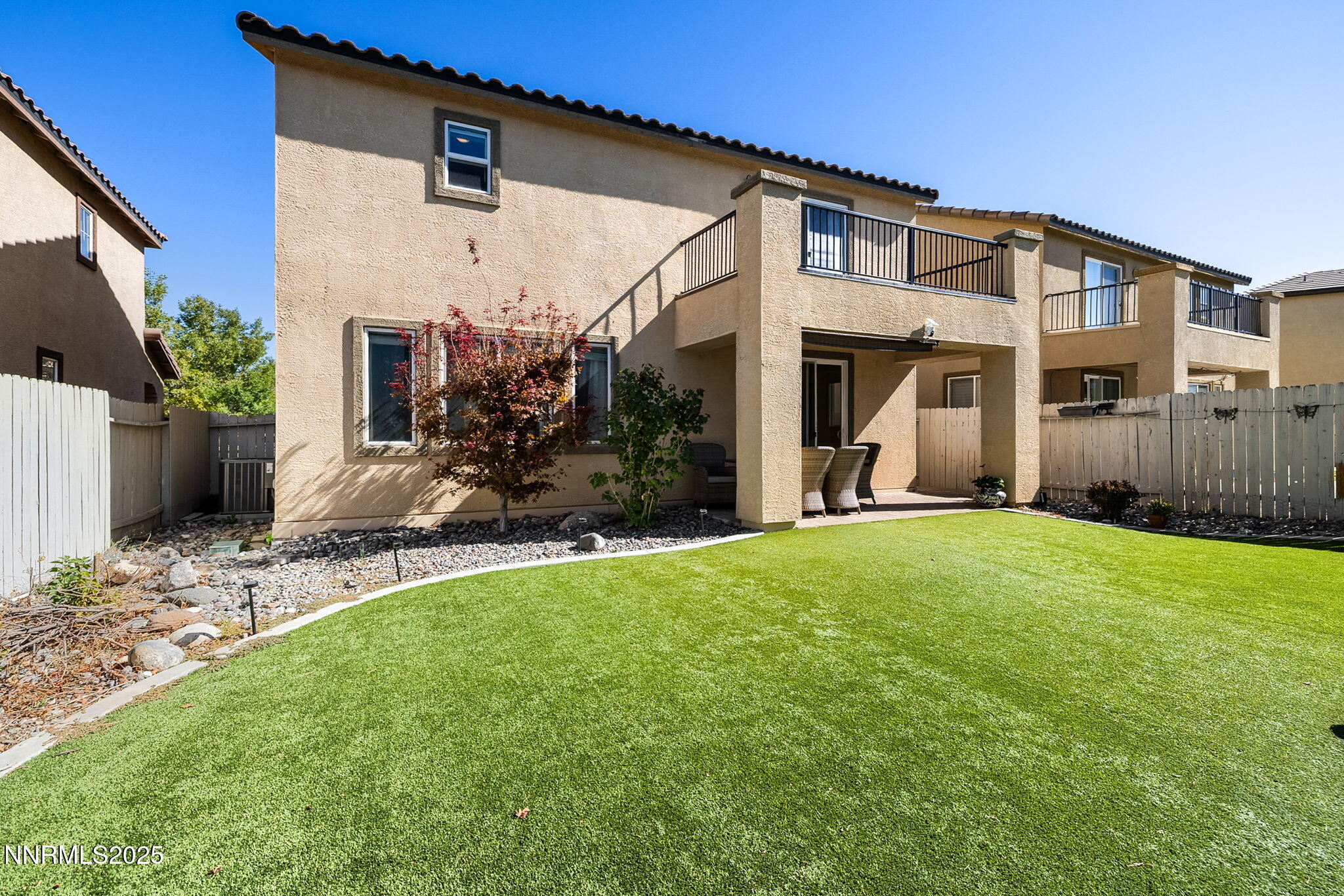 1876 Braemore Drive Reno, NV 89521 - Photo 34 of 34 a view of a house with backyard and a tree