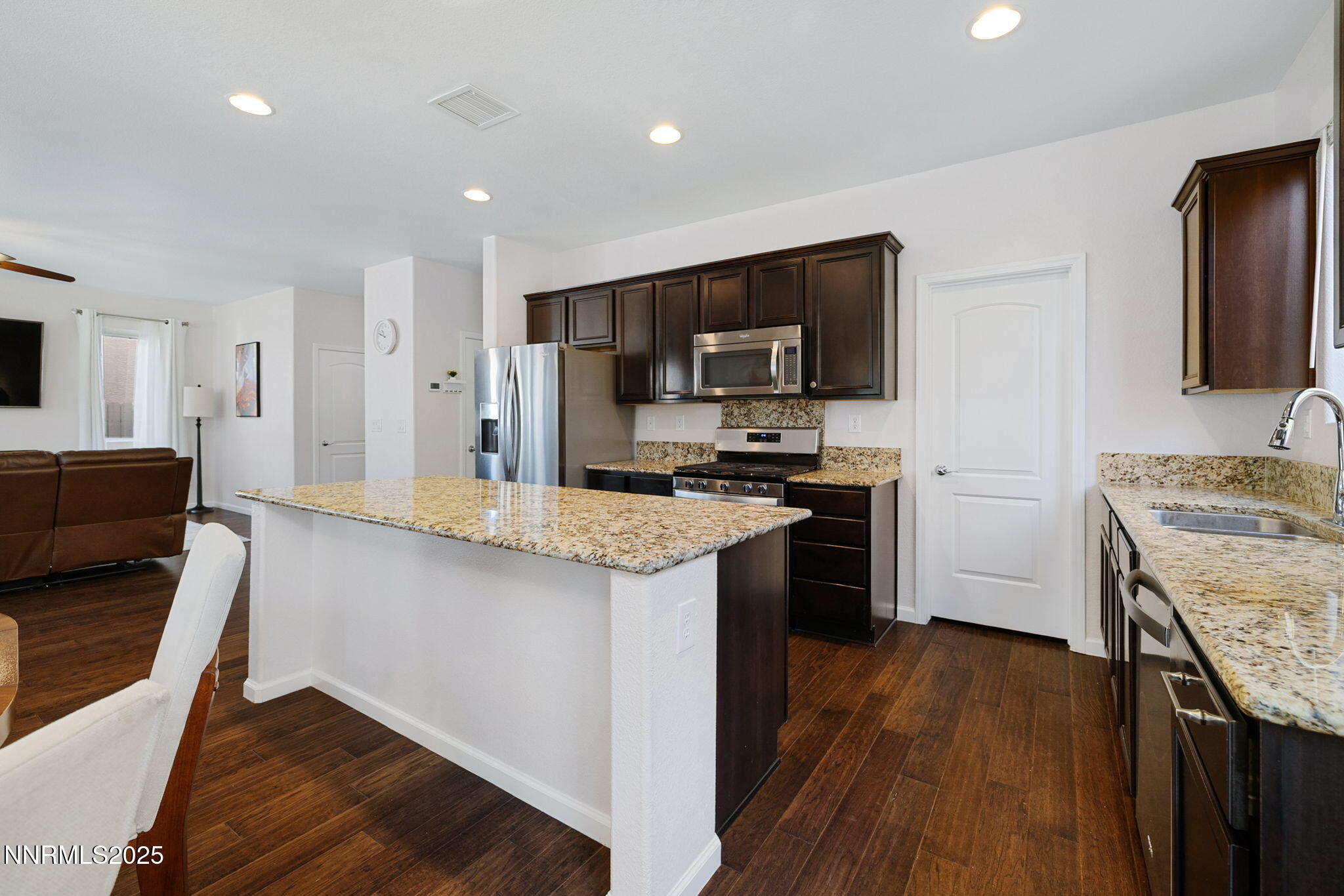 1876 Braemore Drive Reno, NV 89521 - Photo 5 of 34 a kitchen with a sink stove and refrigerator