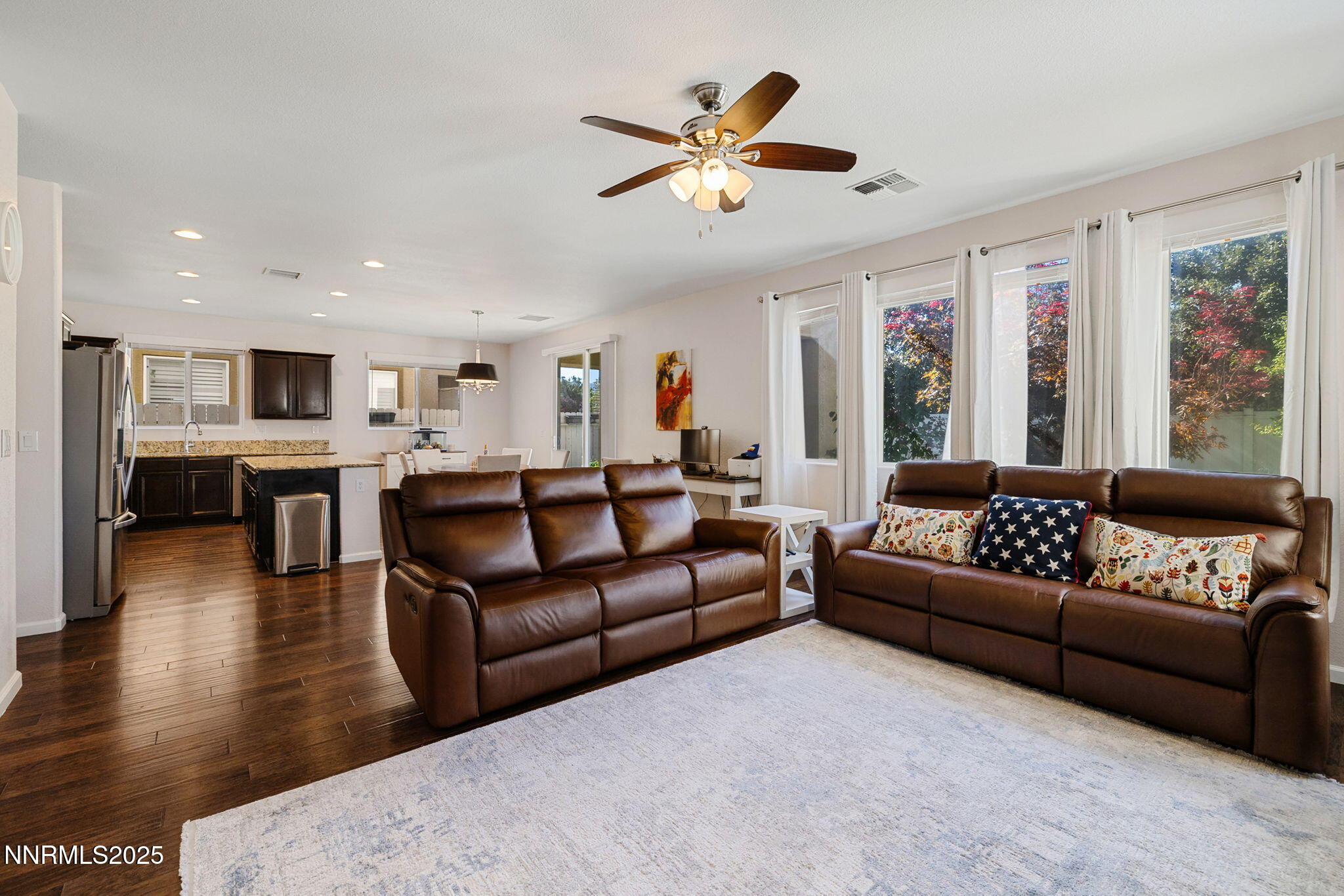 1876 Braemore Drive Reno, NV 89521 - Photo 6 of 34 a living room with furniture and a large window