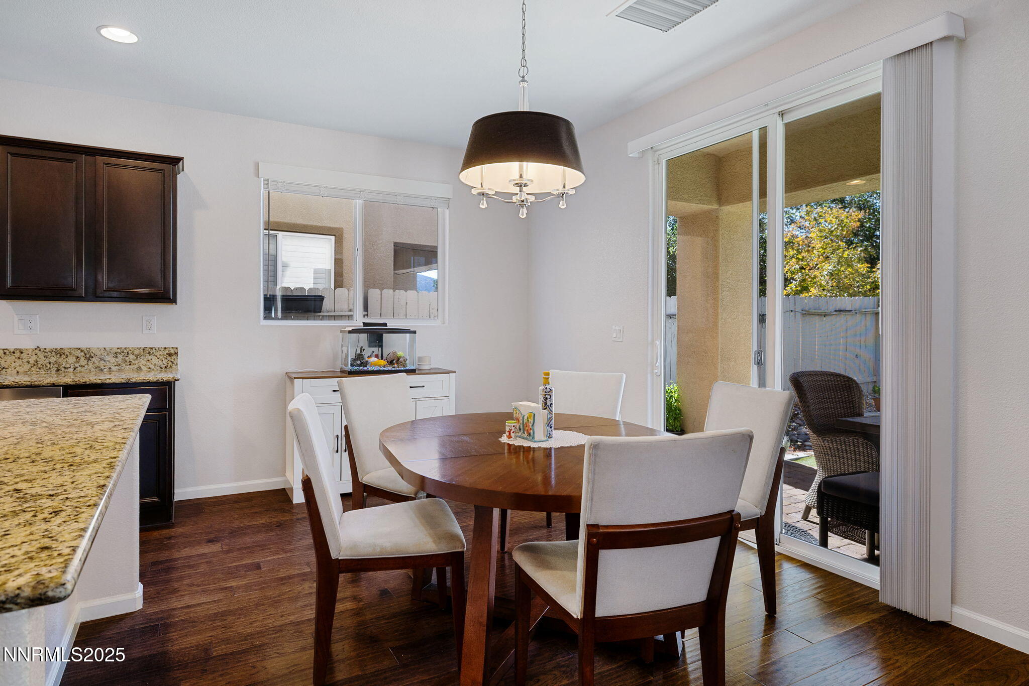 1876 Braemore Drive Reno, NV 89521 - Photo 8 of 34 a dining room with furniture and window