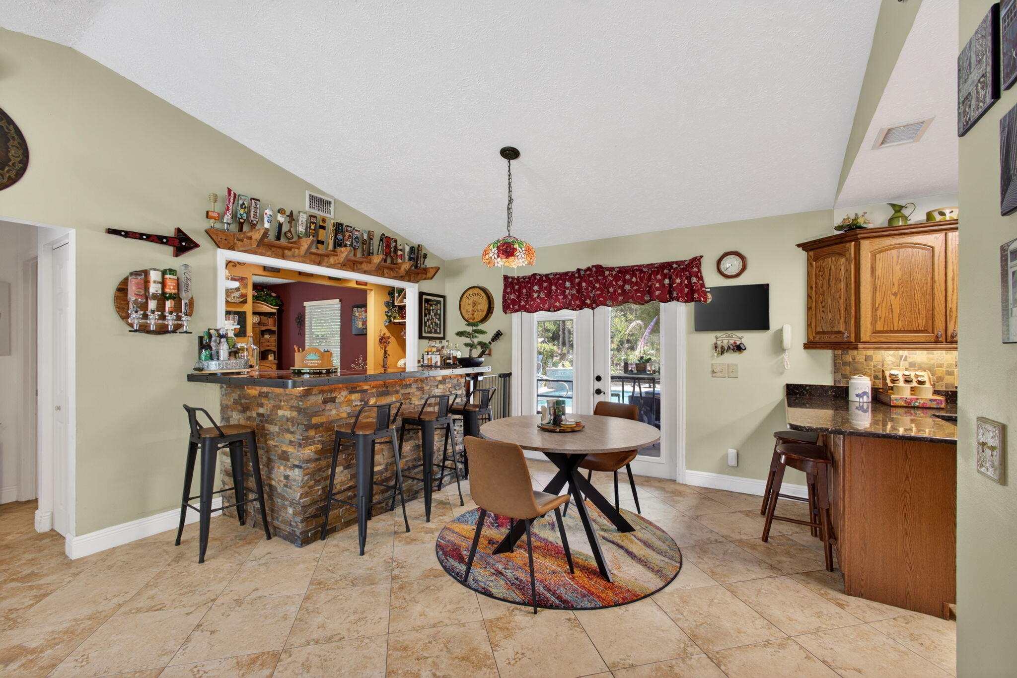 12558 165th Road North Jupiter, FL 33478 - Photo 19 of 67 a view of a dining room with furniture