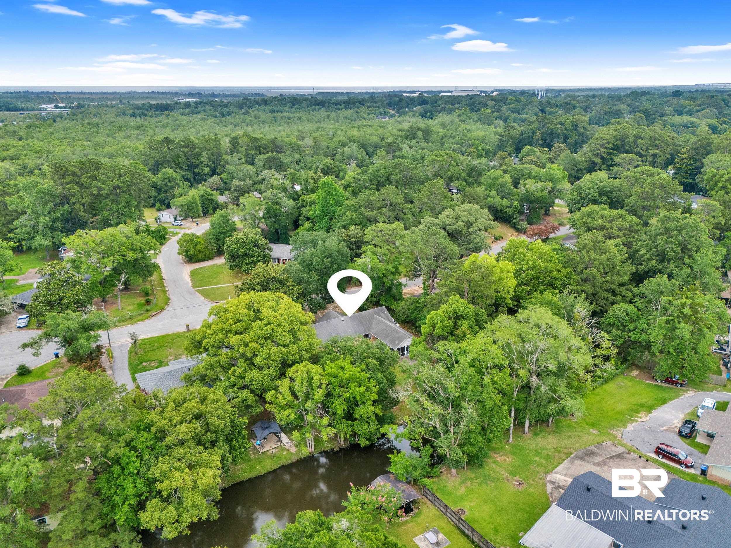 224 Cache Circle Mobile, AL 36611 - Photo 38 of 42 Aerial overview of property's location featuring a forest