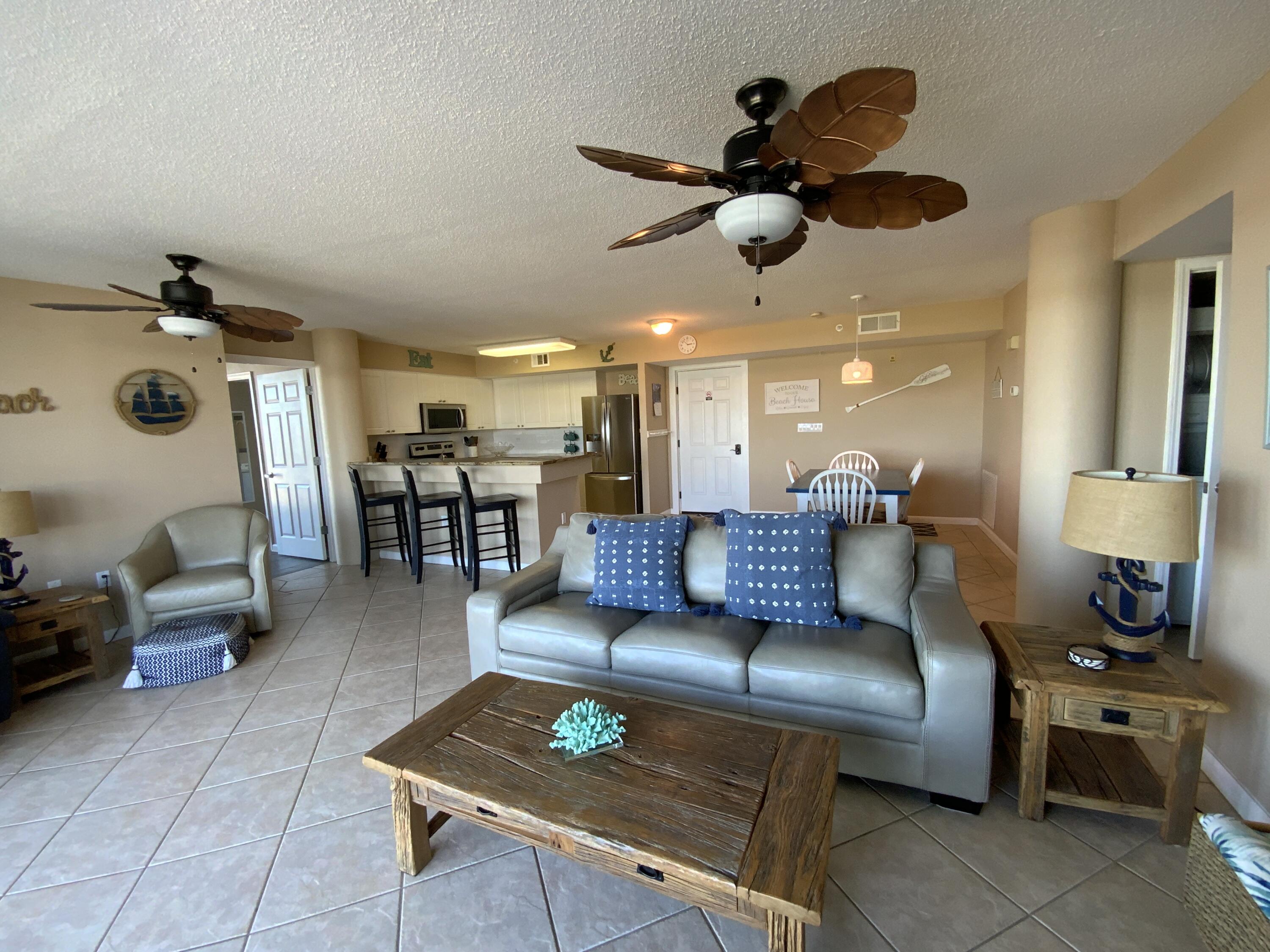 670 Santa Rosa Boulevard, Unit 503 Fort Walton Beach, FL 32548 - Photo 12 of 44 a living room with furniture and a wooden floor