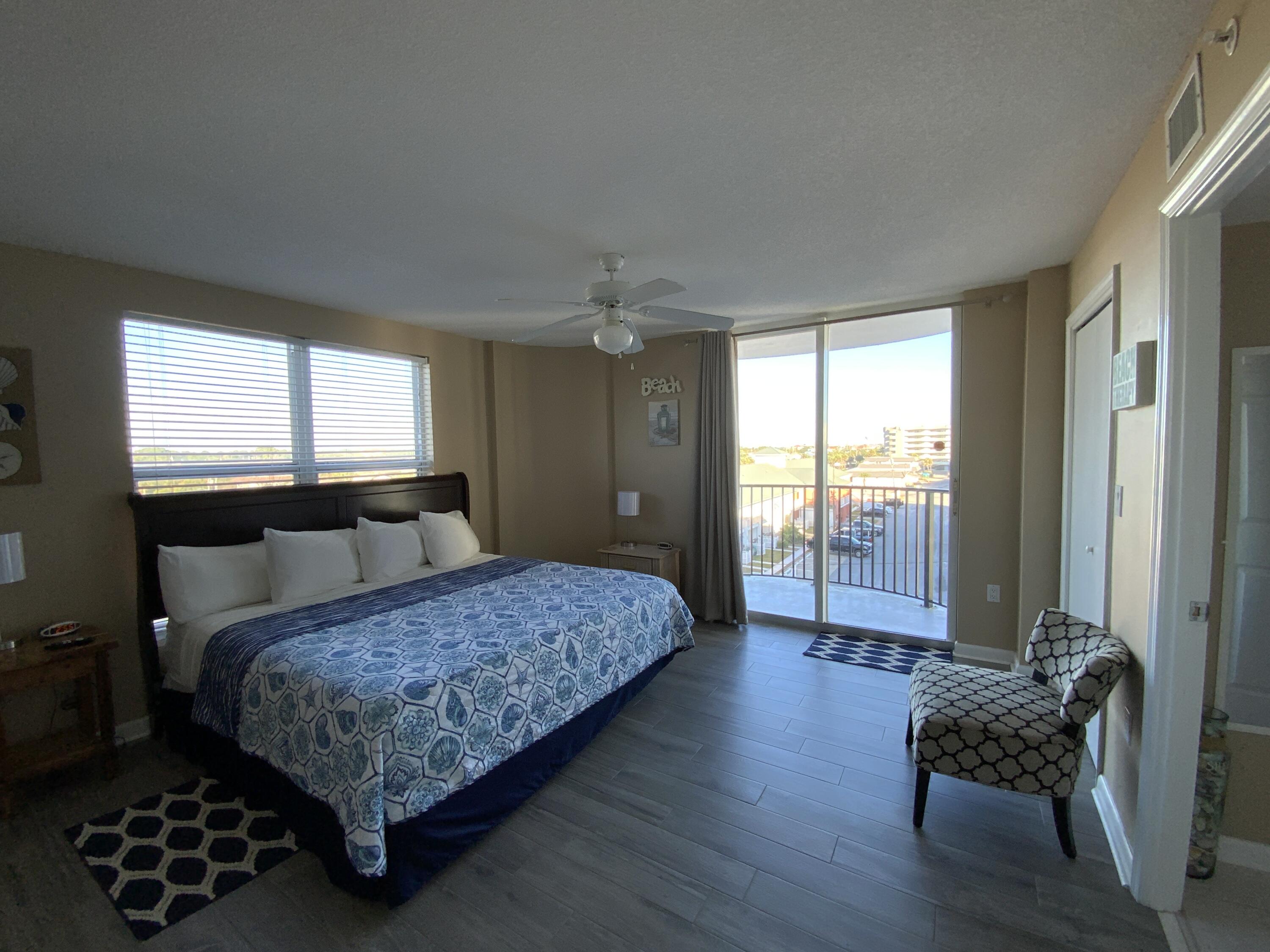 670 Santa Rosa Boulevard, Unit 503 Fort Walton Beach, FL 32548 - Photo 20 of 44 a bedroom with a bed and a window