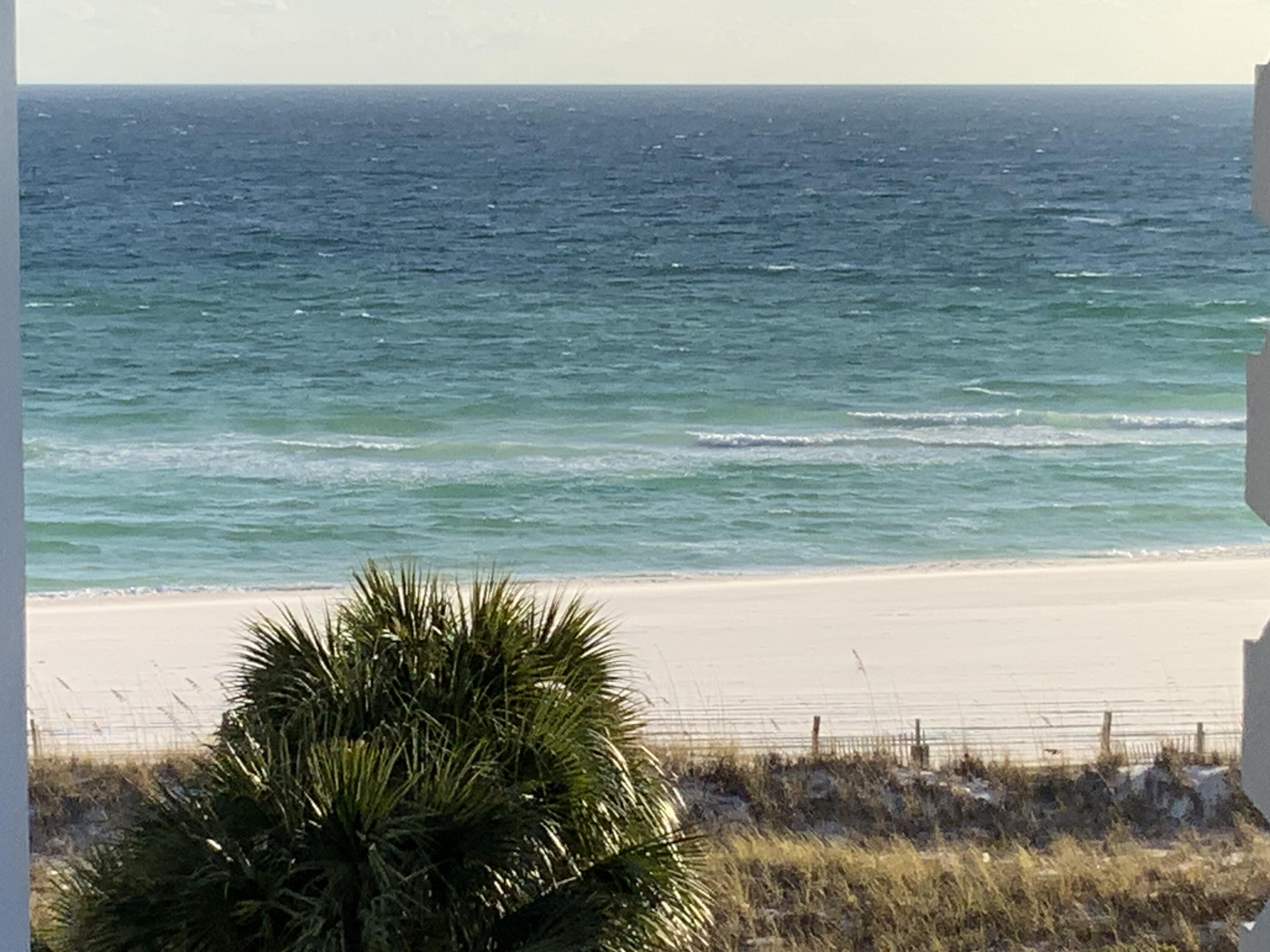670 Santa Rosa Boulevard, Unit 503 Fort Walton Beach, FL 32548 - Photo 2 of 44 a view of a lake from a yard