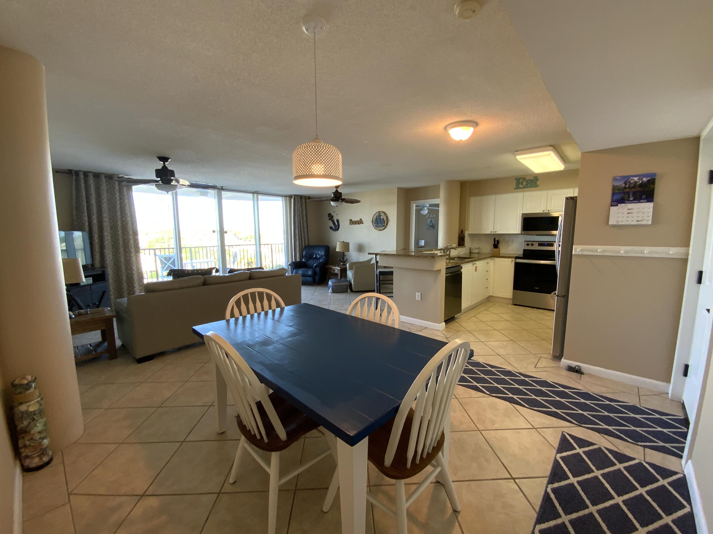 670 Santa Rosa Boulevard, Unit 503 Fort Walton Beach, FL 32548 - Photo 4 of 44 a view of a dining room with furniture