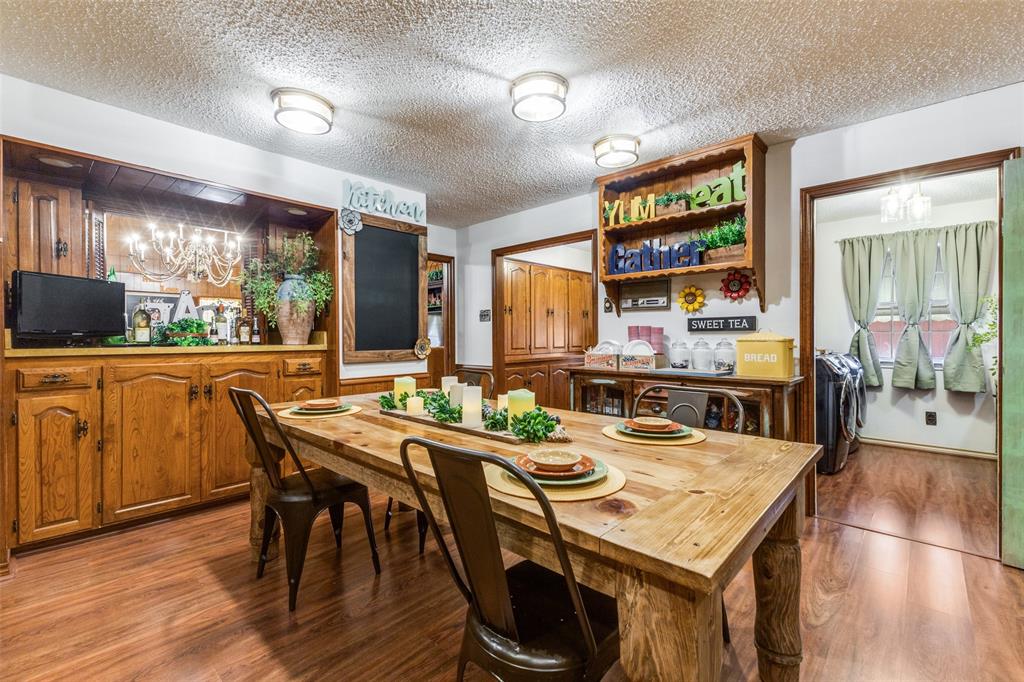 10615 Old Seagoville Road Dallas, TX 75217 - Photo 11 of 33 a view of a dining room with furniture window and outside view