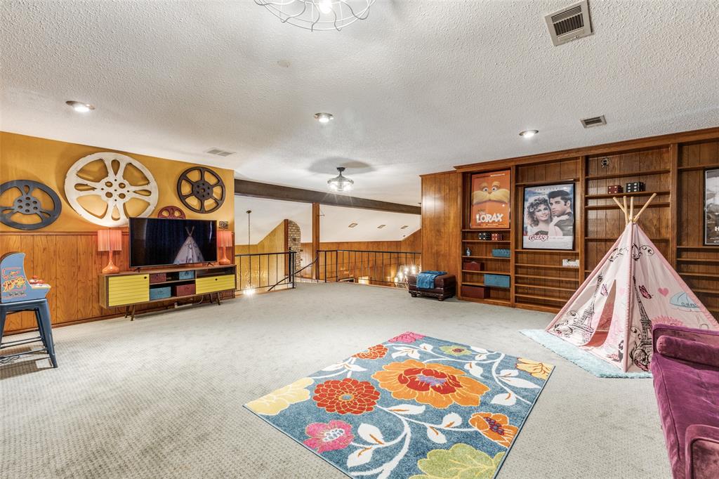 10615 Old Seagoville Road Dallas, TX 75217 - Photo 19 of 33 a view of a room with gym equipment and a window