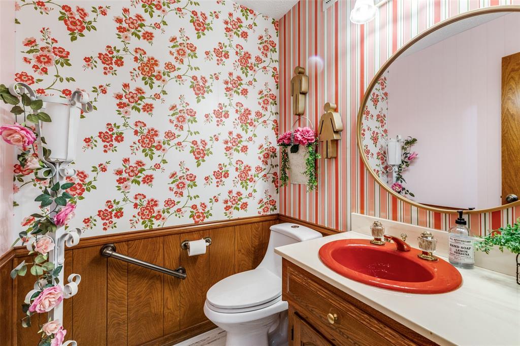 10615 Old Seagoville Road Dallas, TX 75217 - Photo 21 of 33 a bathroom with a sink toilet and mirror