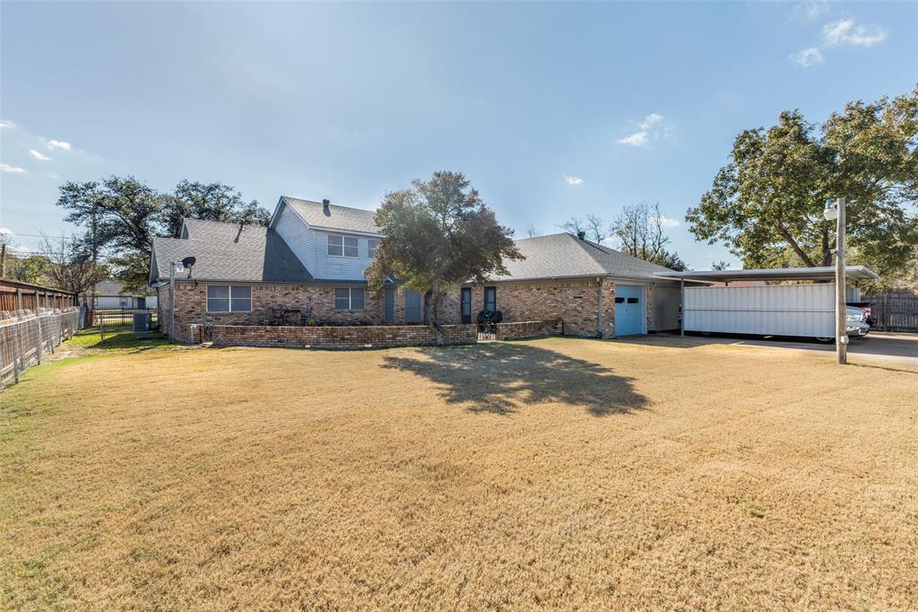 10615 Old Seagoville Road Dallas, TX 75217 - Photo 30 of 33 a house view with a outdoor space