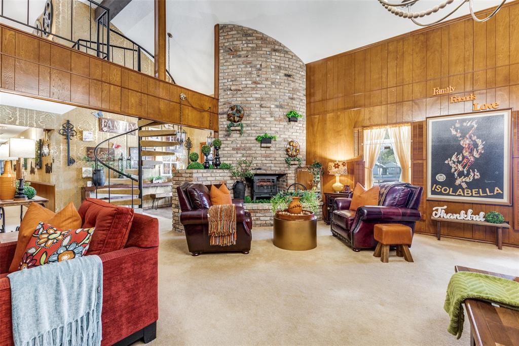 10615 Old Seagoville Road Dallas, TX 75217 - Photo 4 of 33 a living room with furniture a fireplace