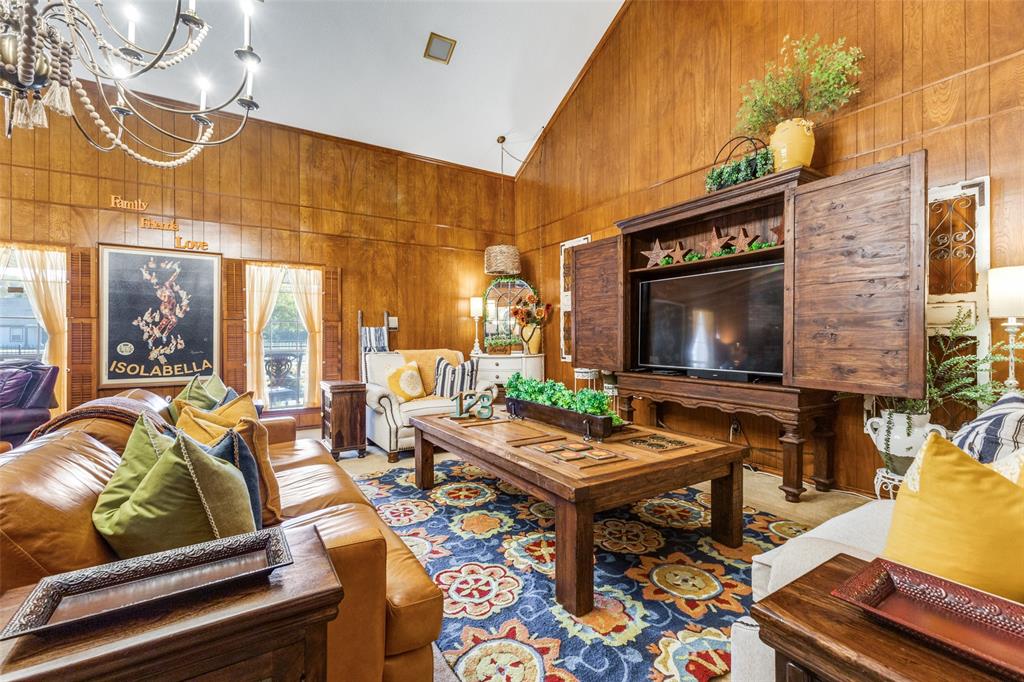 10615 Old Seagoville Road Dallas, TX 75217 - Photo 6 of 33 a living room with furniture and a flat screen tv