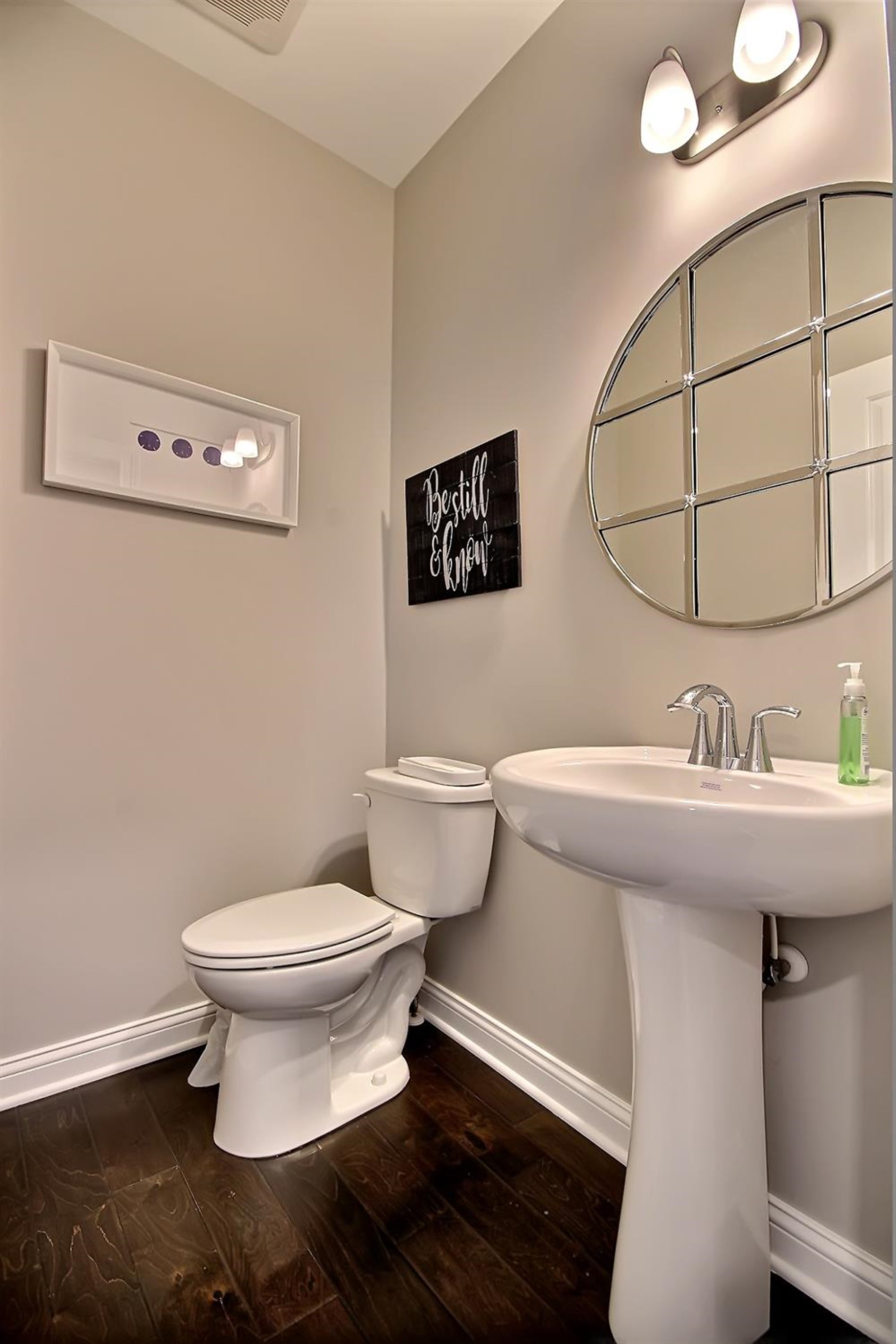 5740 Burr Rdg Circle Crown Point, IN 46307 - Photo 14 of 26 a bathroom with a sink and a toilet
