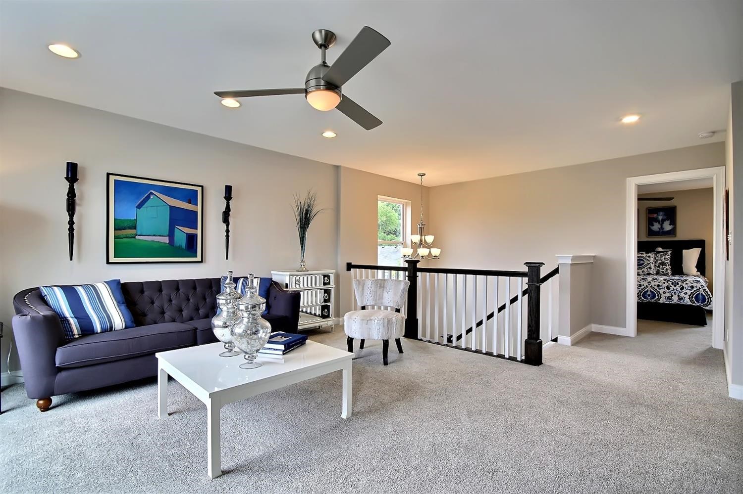 5740 Burr Rdg Circle Crown Point, IN 46307 - Photo 15 of 26 a living room with furniture and a ceiling fan