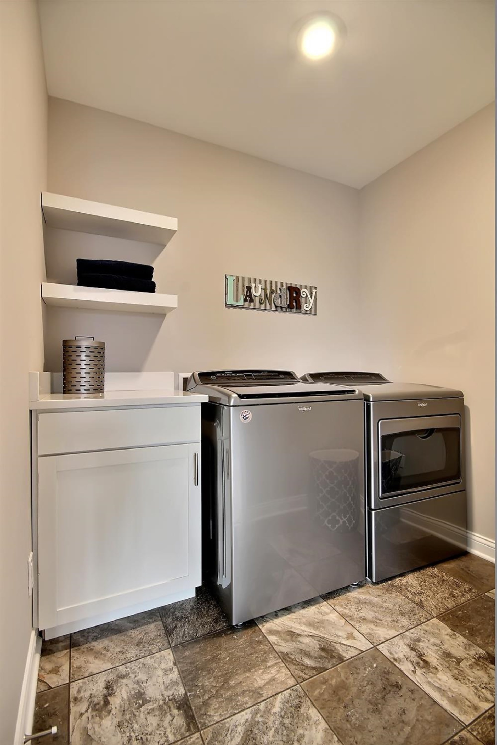5740 Burr Rdg Circle Crown Point, IN 46307 - Photo 24 of 26 a view of a refrigerator in kitchen and an empty room