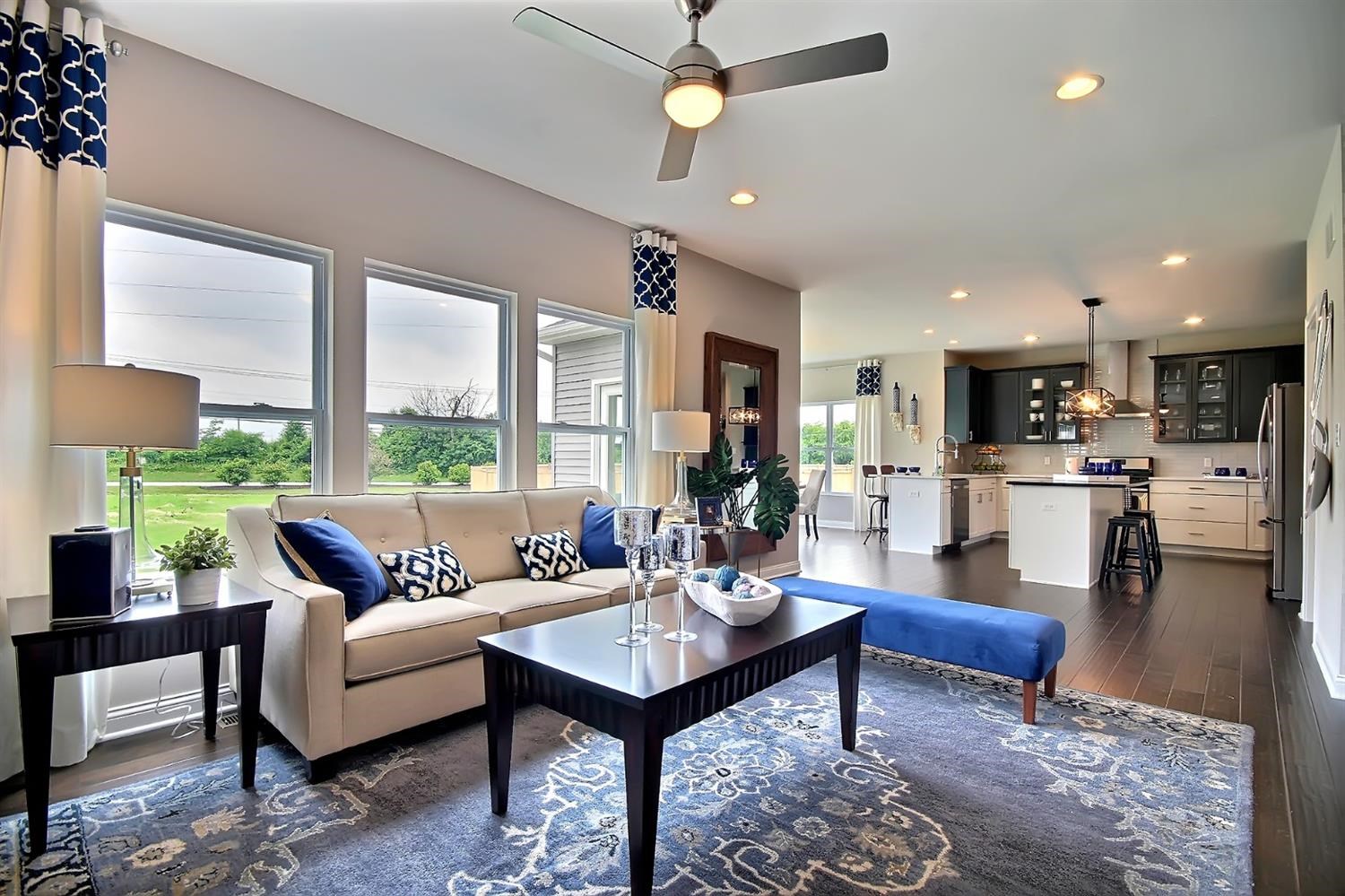 5740 Burr Rdg Circle Crown Point, IN 46307 - Photo 8 of 26 a living room with furniture kitchen view and a large window