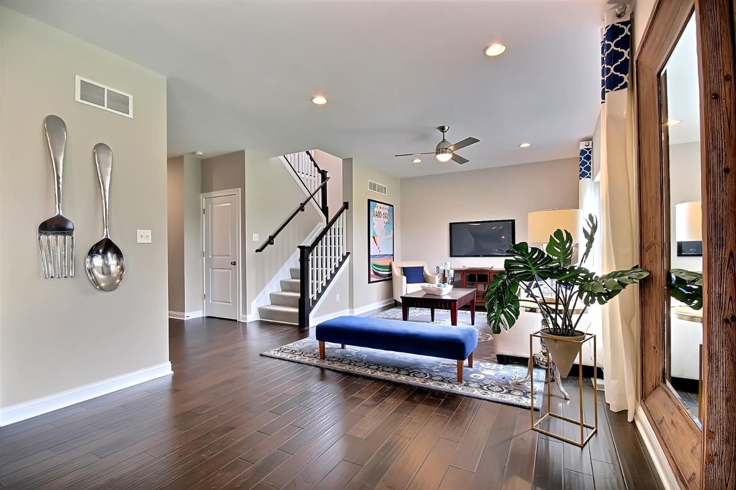 5740 Burr Rdg Circle Crown Point, IN 46307 - Photo 10 of 26 a living room with furniture and a wooden floor