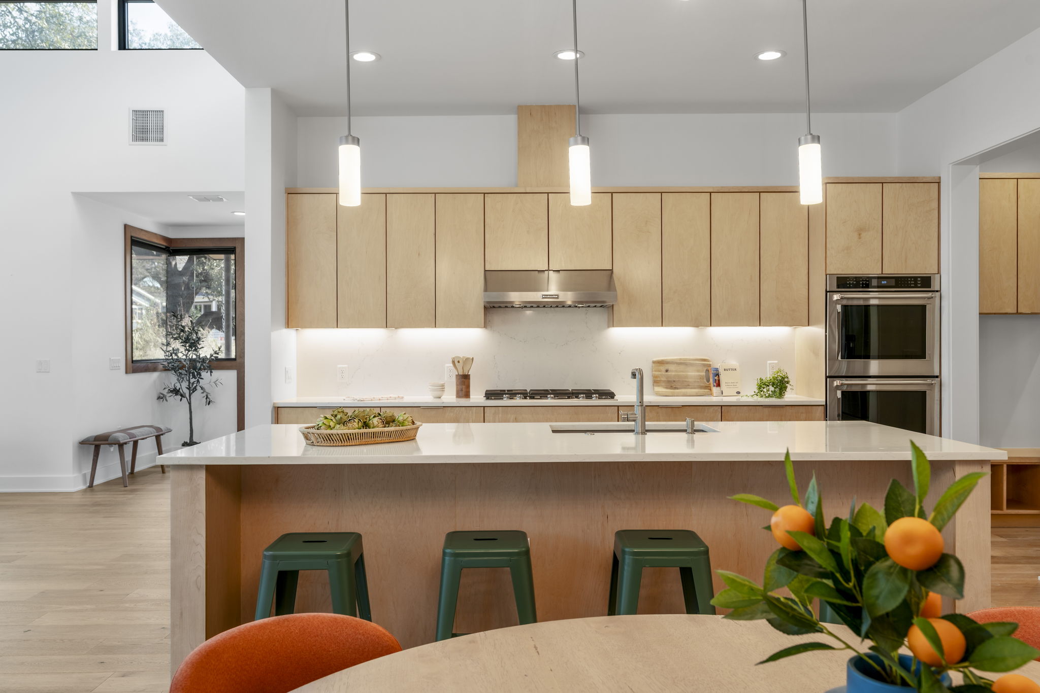 4602 Rue Street Austin, TX 78731 - Photo 15 of 39 a kitchen with stainless steel appliances granite countertop a sink a stove and a refrigerator