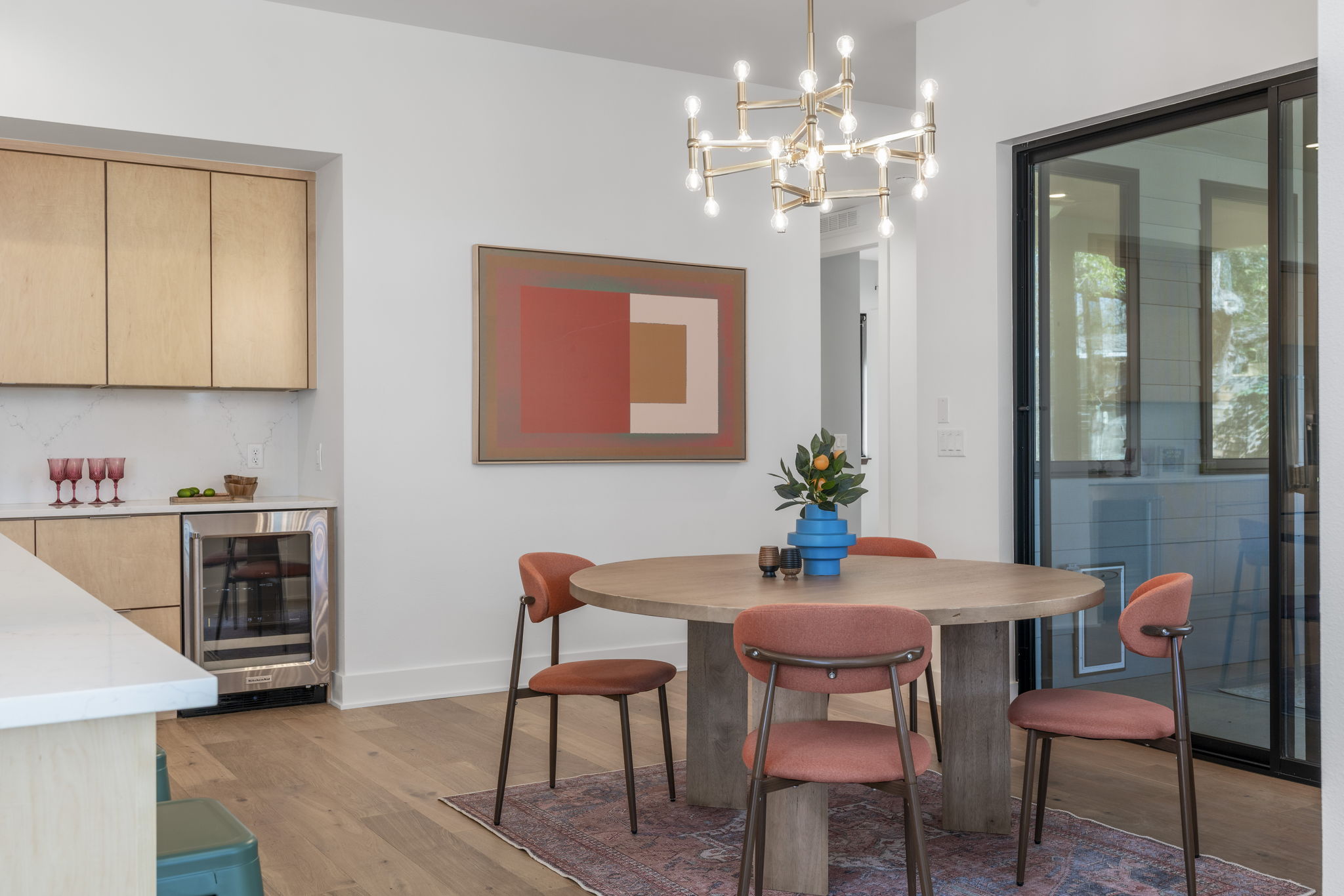4602 Rue Street Austin, TX 78731 - Photo 20 of 39 a view of a dining room with furniture and chandelier