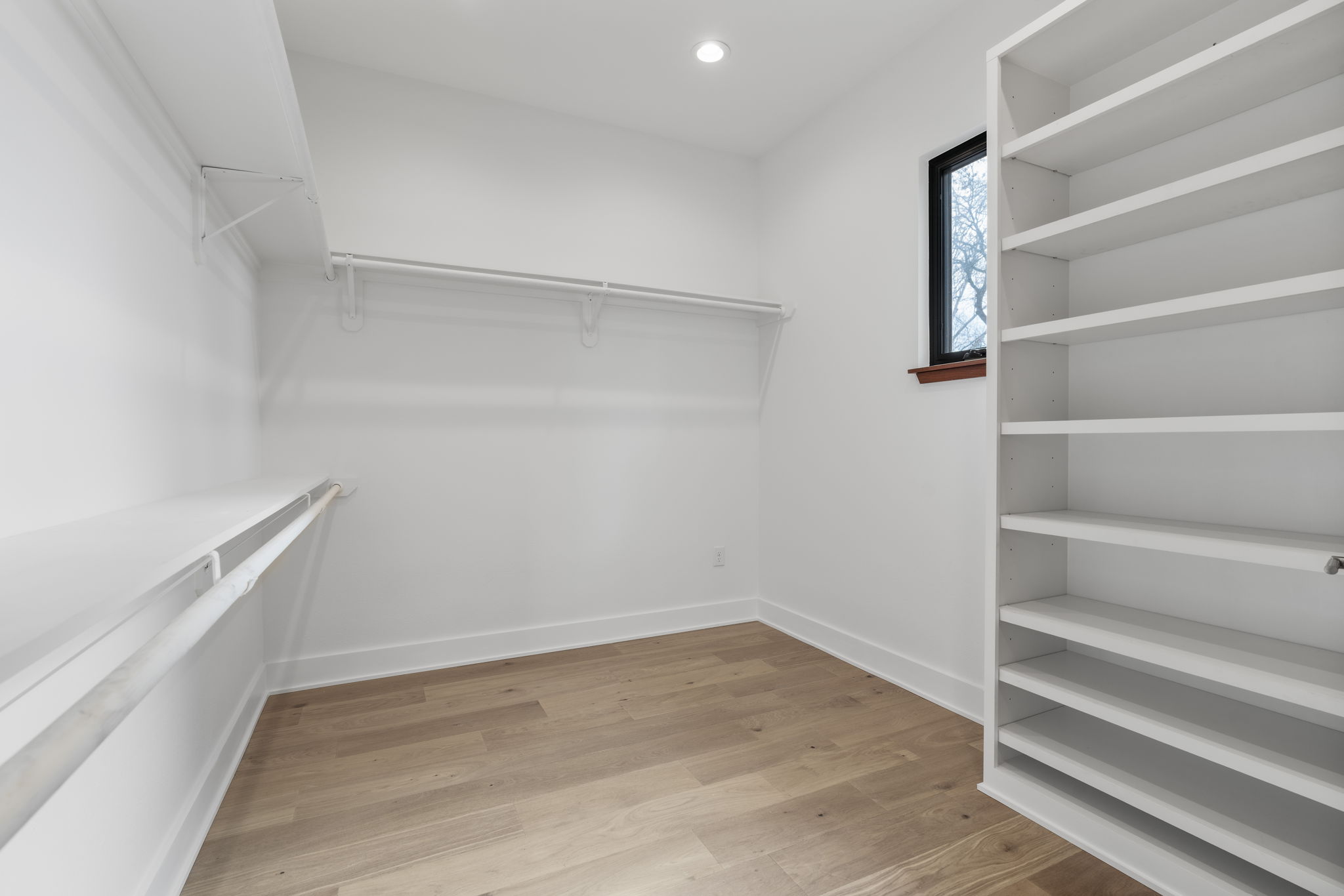 4602 Rue Street Austin, TX 78731 - Photo 25 of 39 a view of an empty walk in closet