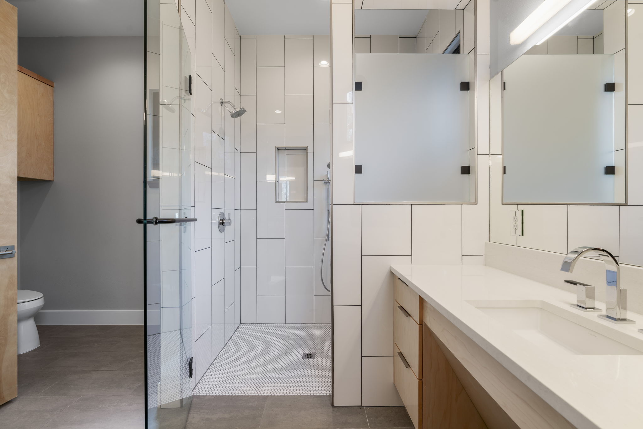 4602 Rue Street Austin, TX 78731 - Photo 29 of 39 a bathroom with a shower sink and toilet