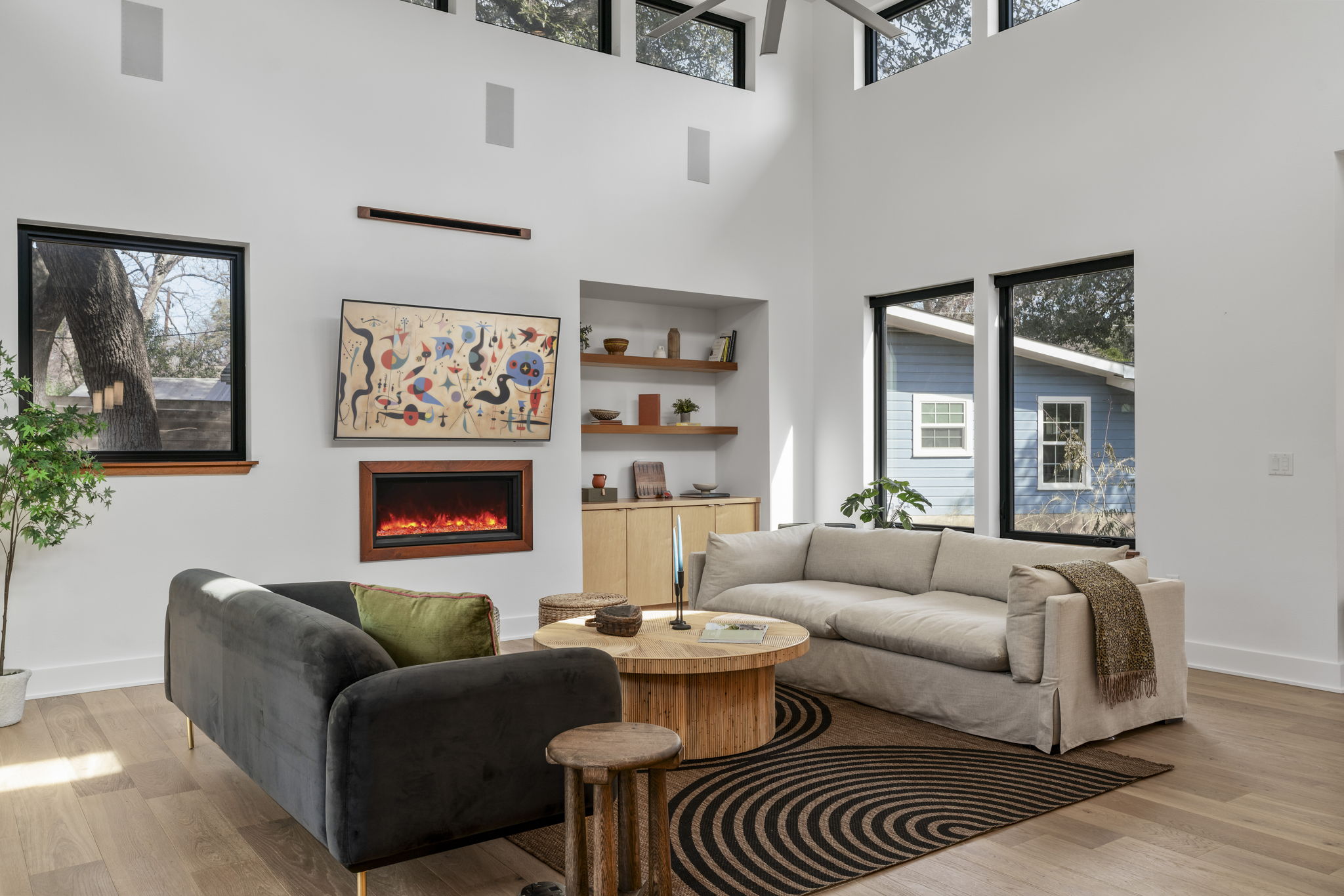 4602 Rue Street Austin, TX 78731 - Photo 8 of 39 a living room with furniture and a fireplace