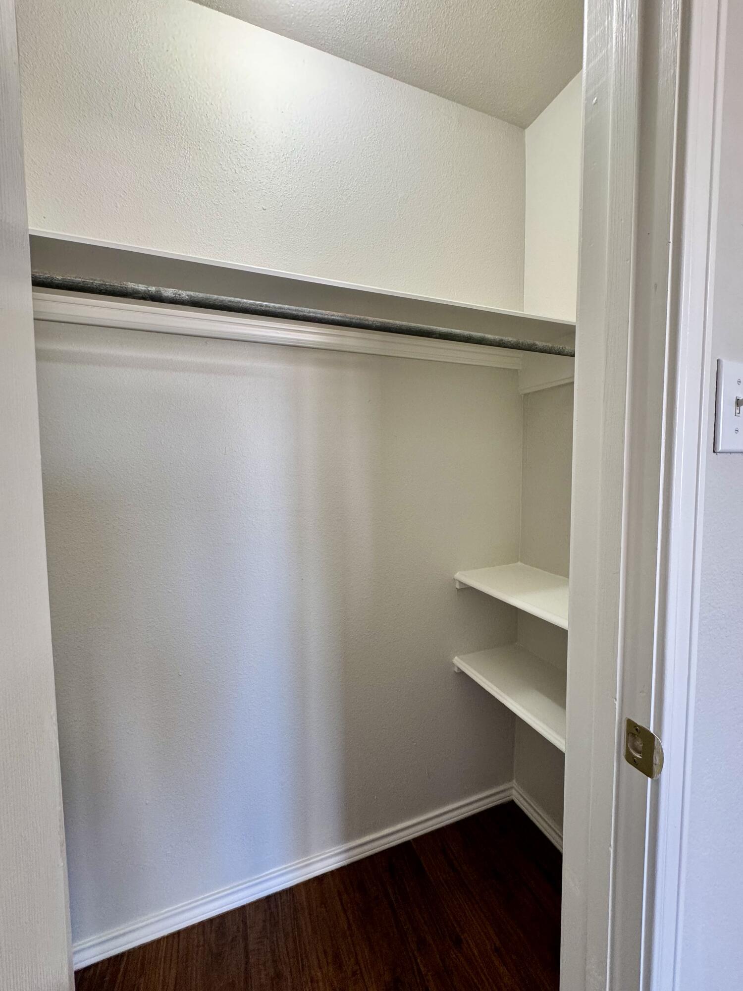 5421 94th Street Lubbock, TX 79424 - Photo 12 of 22 a view of an empty walk in closet