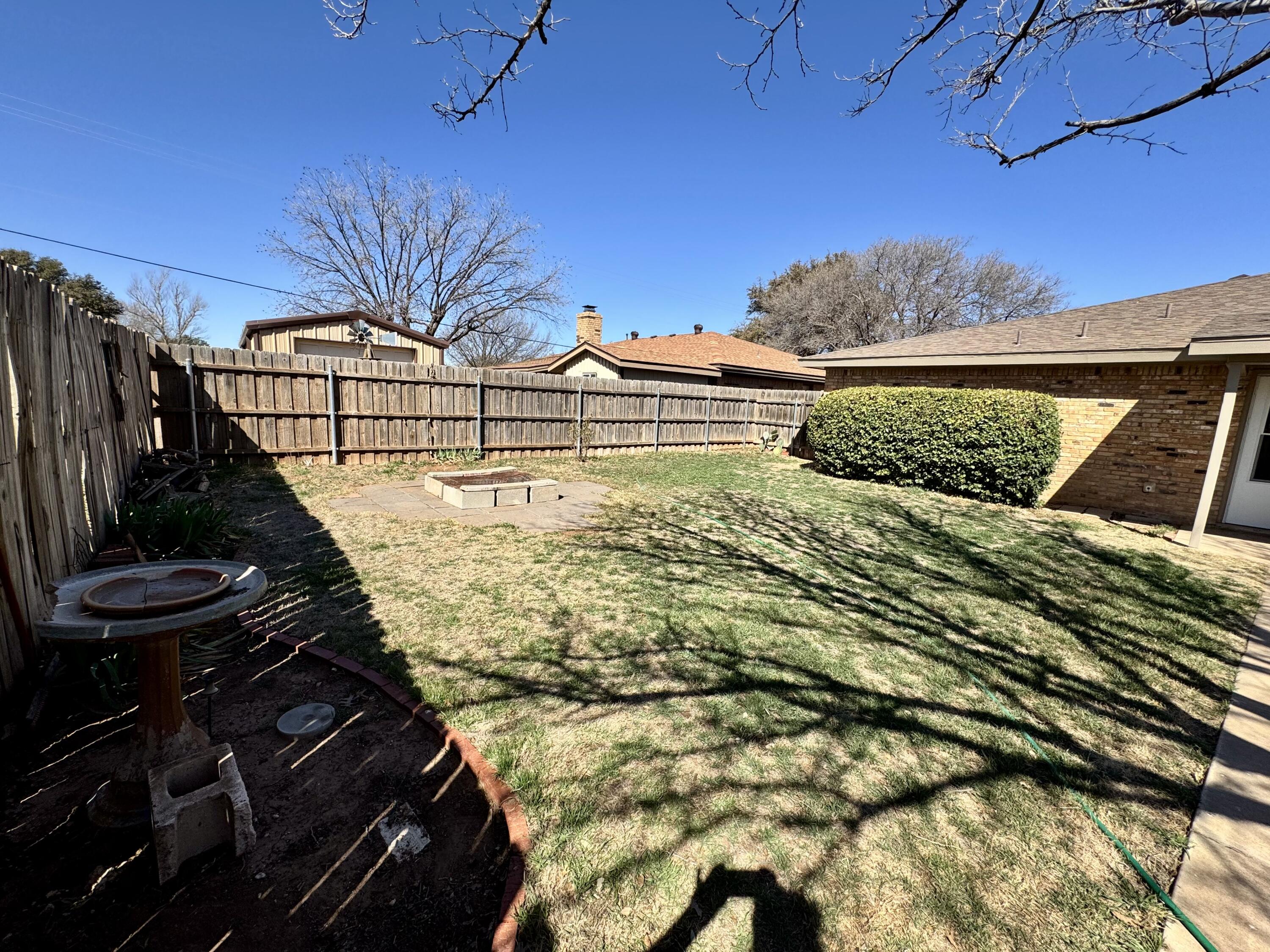 5421 94th Street Lubbock, TX 79424 - Photo 20 of 22 a view of a backyard of the house
