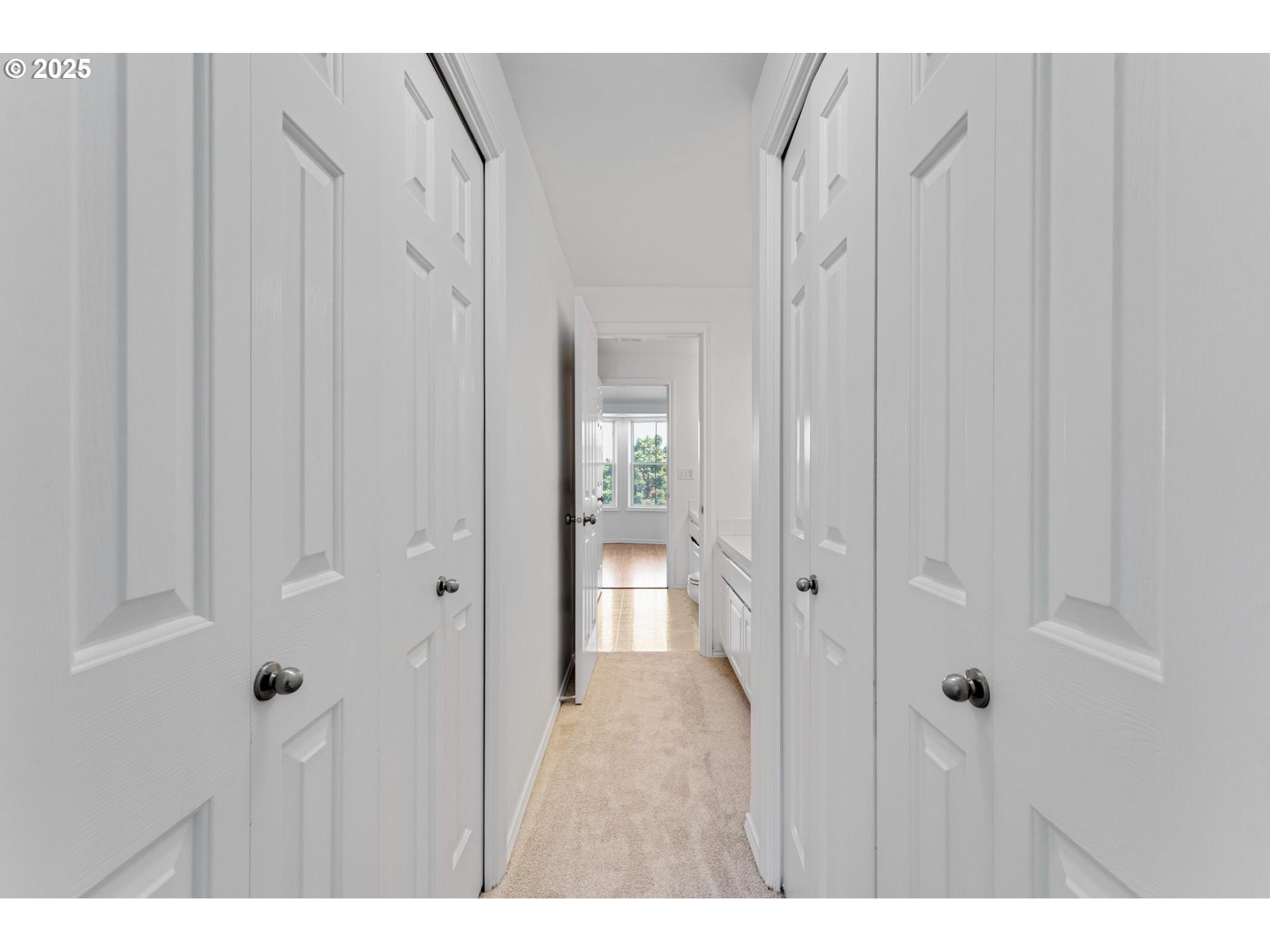 4815 Southwest 1st Avenue Portland, OR 97239 - Photo 20 of 43 a view of a bathroom from a hallway