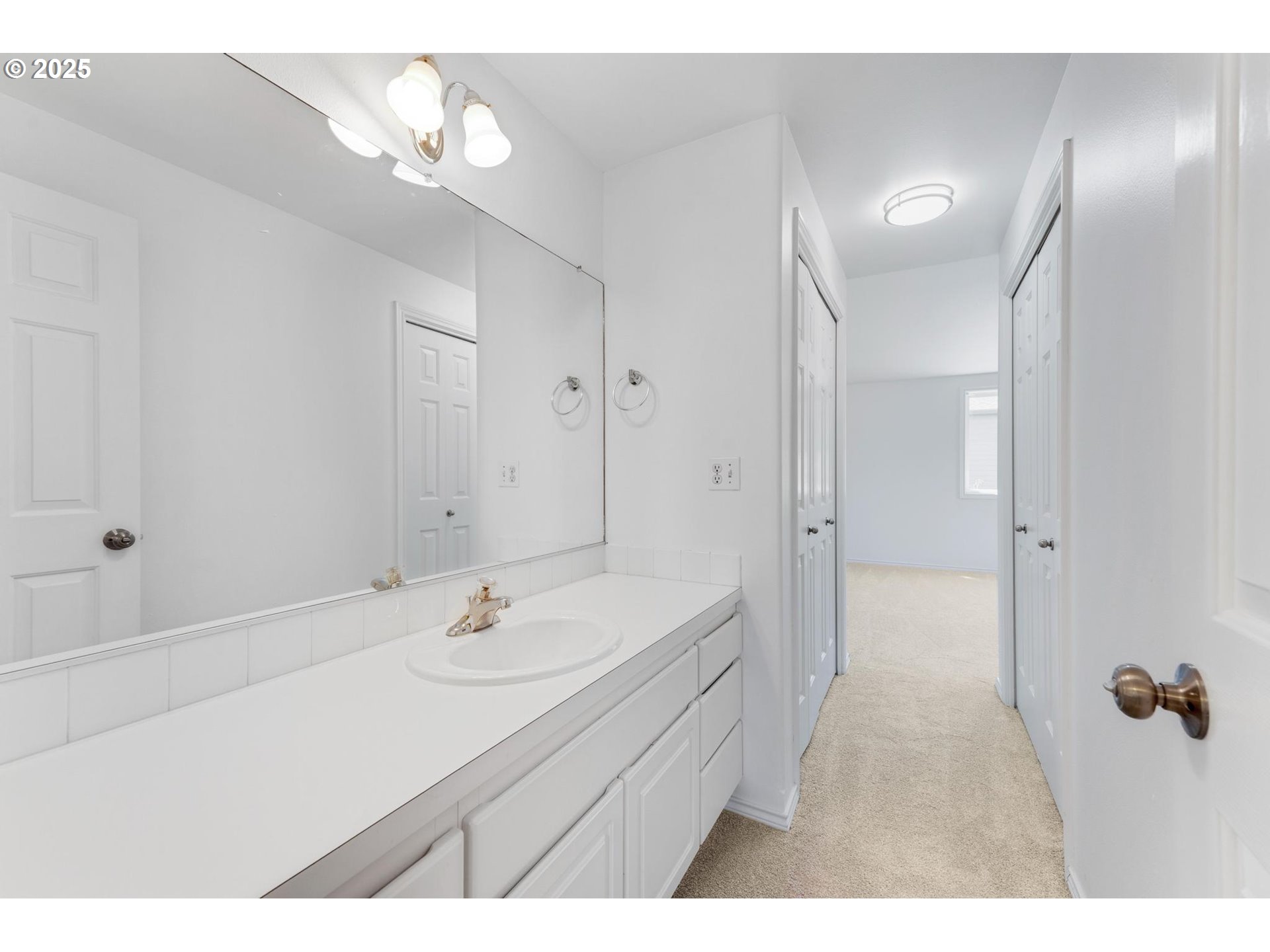 4815 Southwest 1st Avenue Portland, OR 97239 - Photo 24 of 43 a bathroom with a sink a toilet and shower